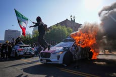 LA protesters charged after fireworks hurled at police, officials say