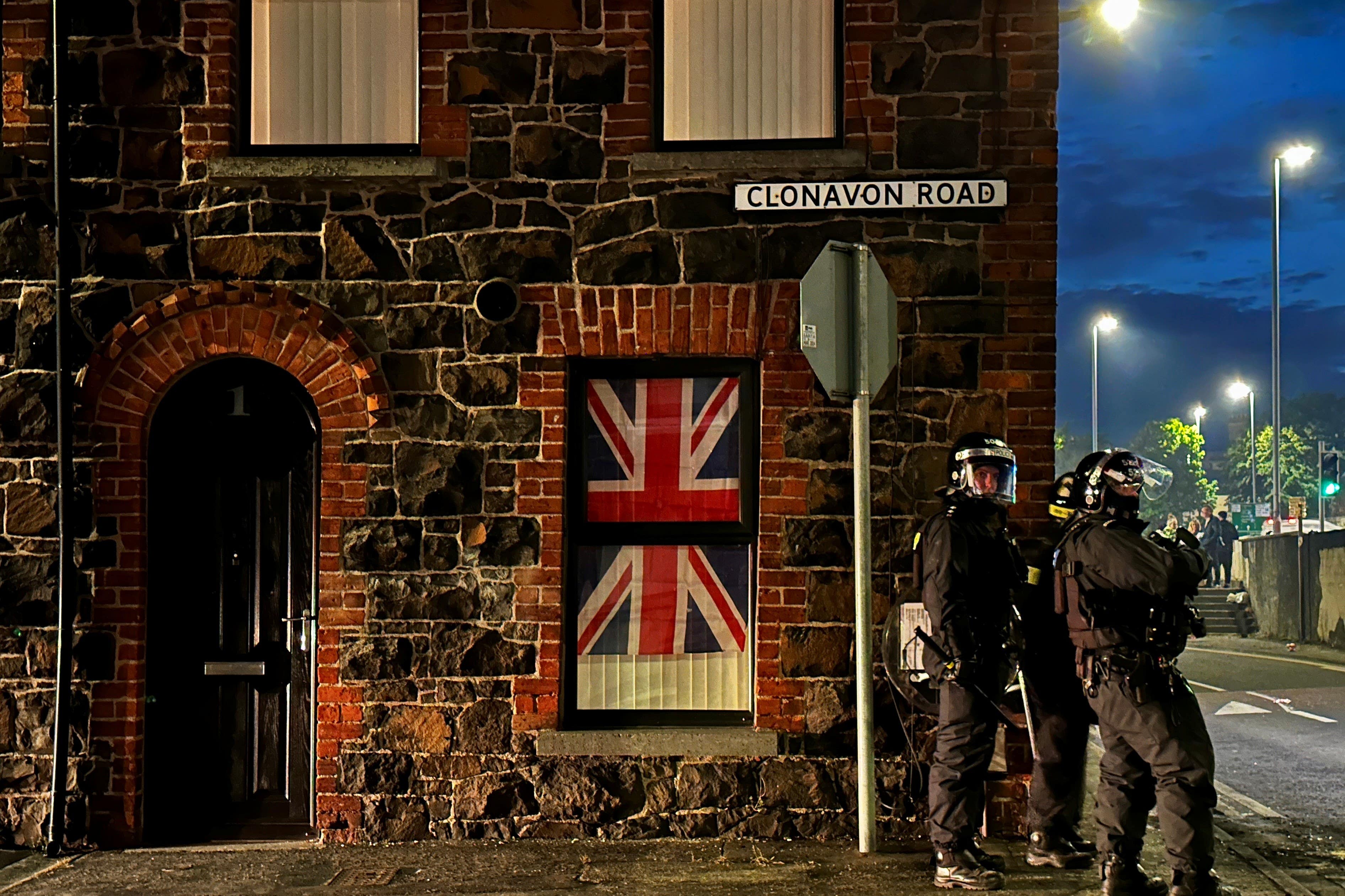 Police officers on Clonavon Road in Ballymena (Liam McBurney/PA)