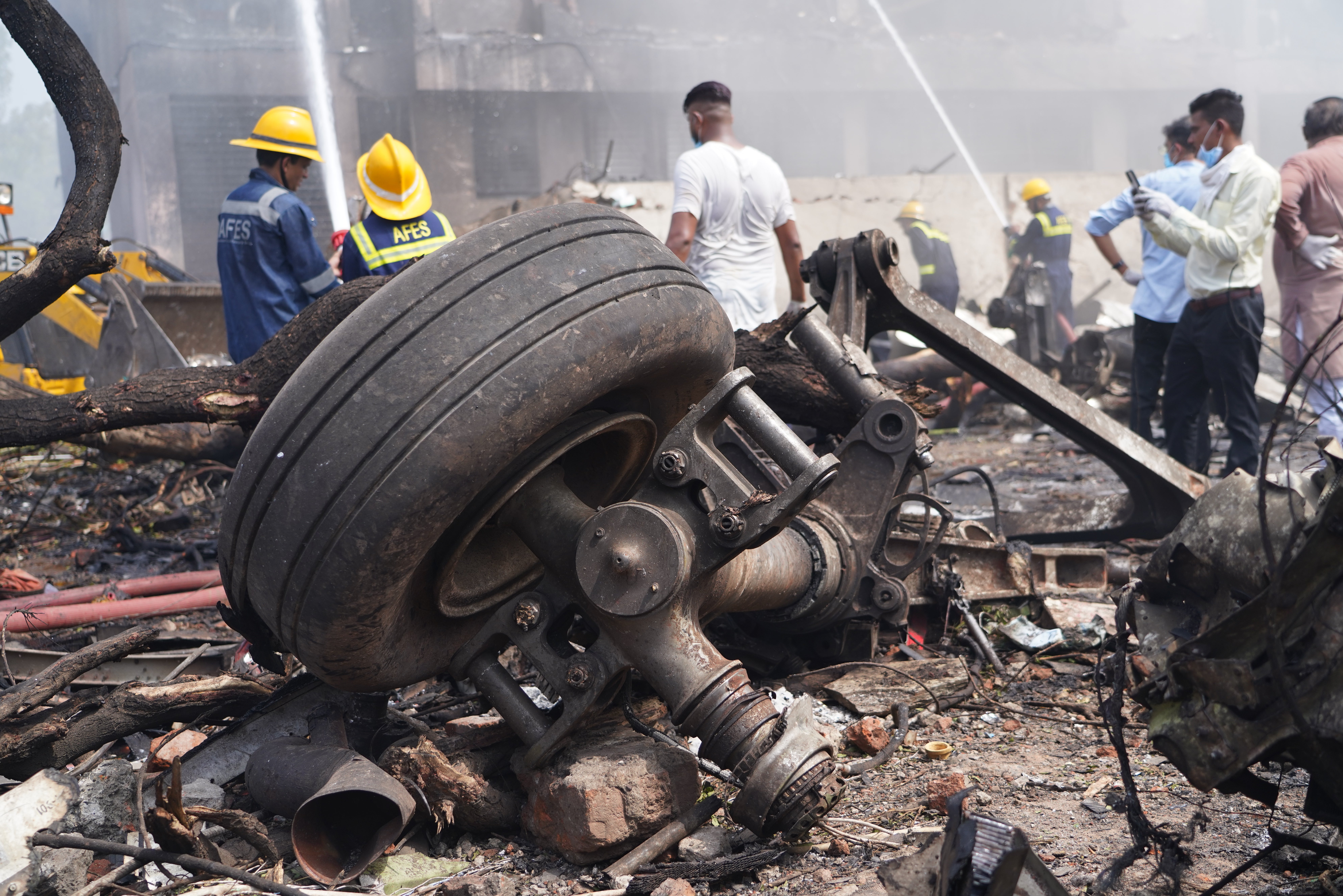 Debris at the site of the crash, near Sardar Vallabhbhai Patel International airport in Ahmedabad, Gujarat