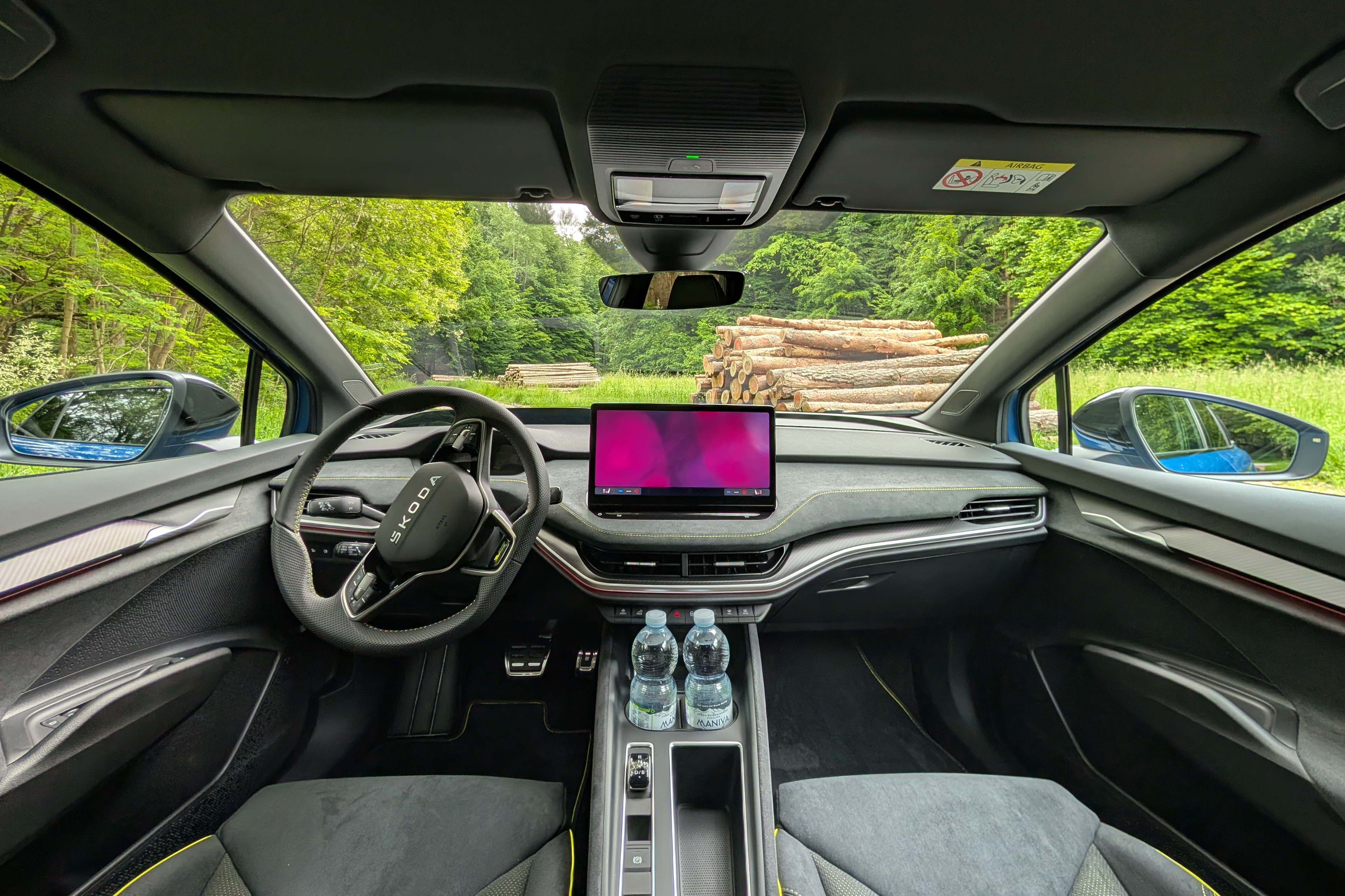 The interior sports a few flourishes, but the floating infotainment tablet and simple lines feel basic overall