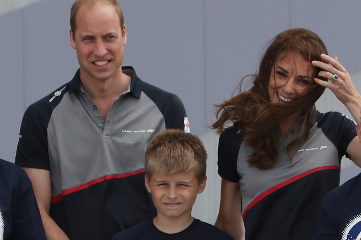 The then Duke and Duchess of Cambridge meet a group of children at the Land Rover BAR team base during a visit to Portsmouth (PA)