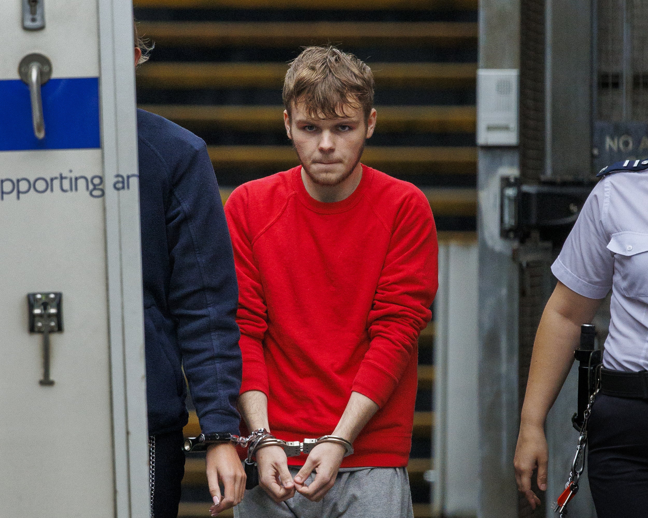 Michael Elliott, 18, leaving Ballymena Courthouse, following a short hearing where he faced charges relating to the disorder