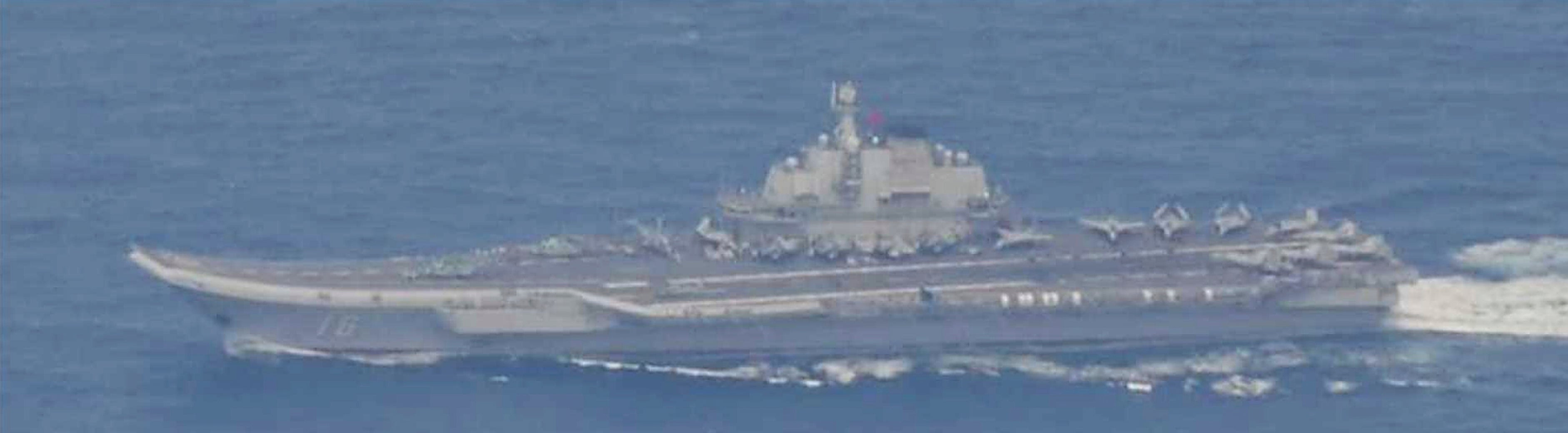 Photo released by Japan's ministry of defence shows Chinese aircraft carrier Liaoning in the Pacific on 7 June