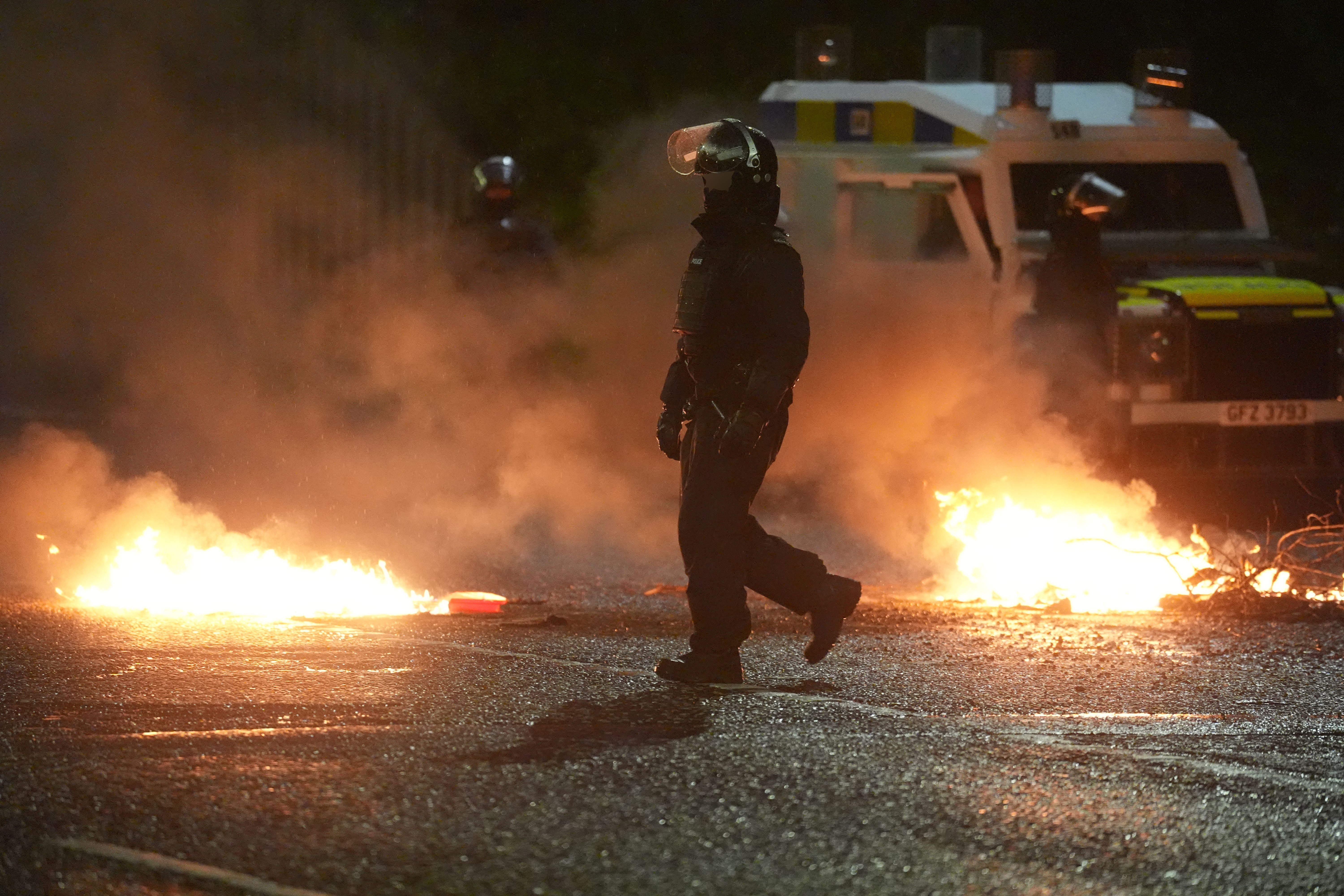 Police in Portadown in Co Armagh, following three nights of disorder in Ballymena, Co Antrim (PA)