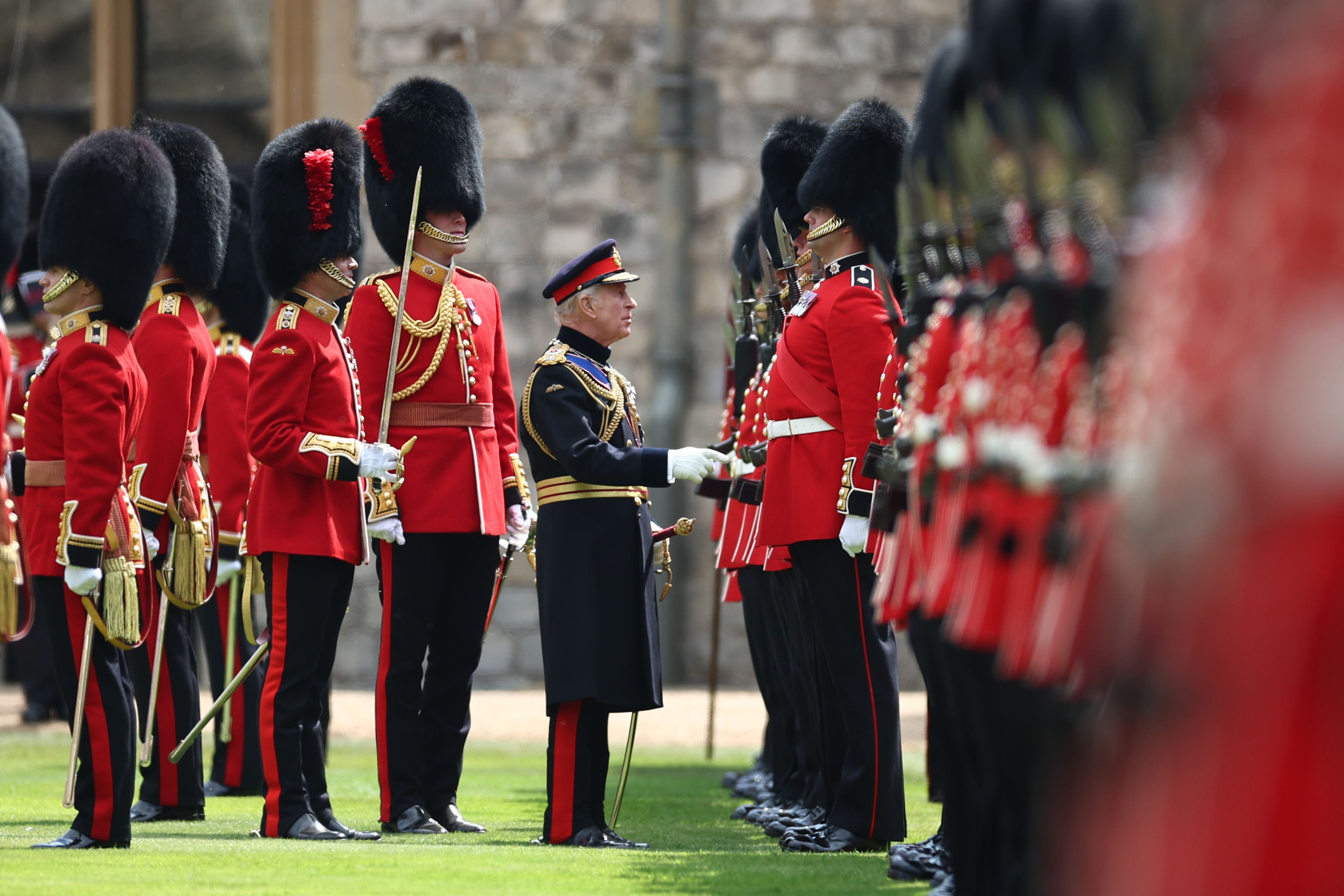 The King presenting Colours to the Coldstream Guards (Henry Nicholls/PA)