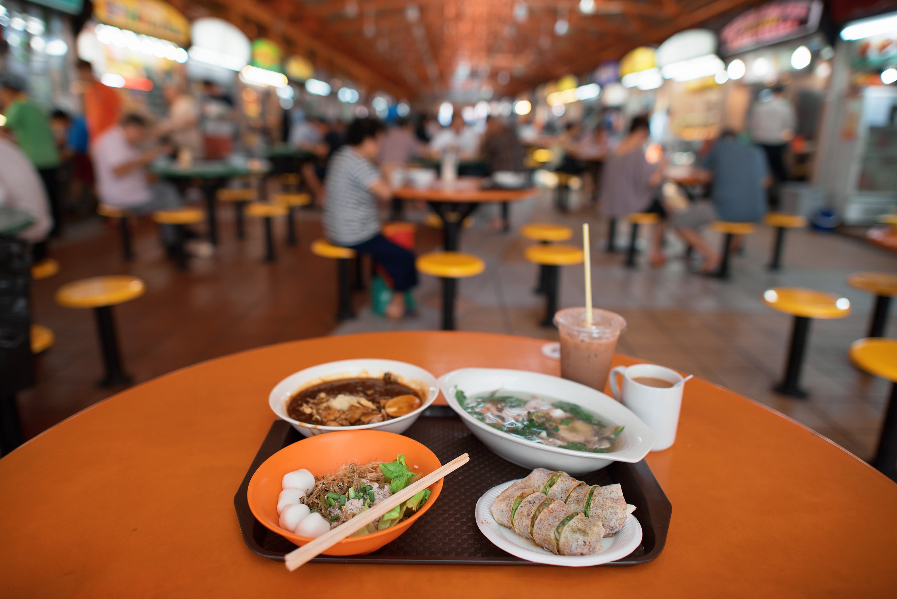 Head to any hawker centre – the satay-scented, Unesco-listed food halls