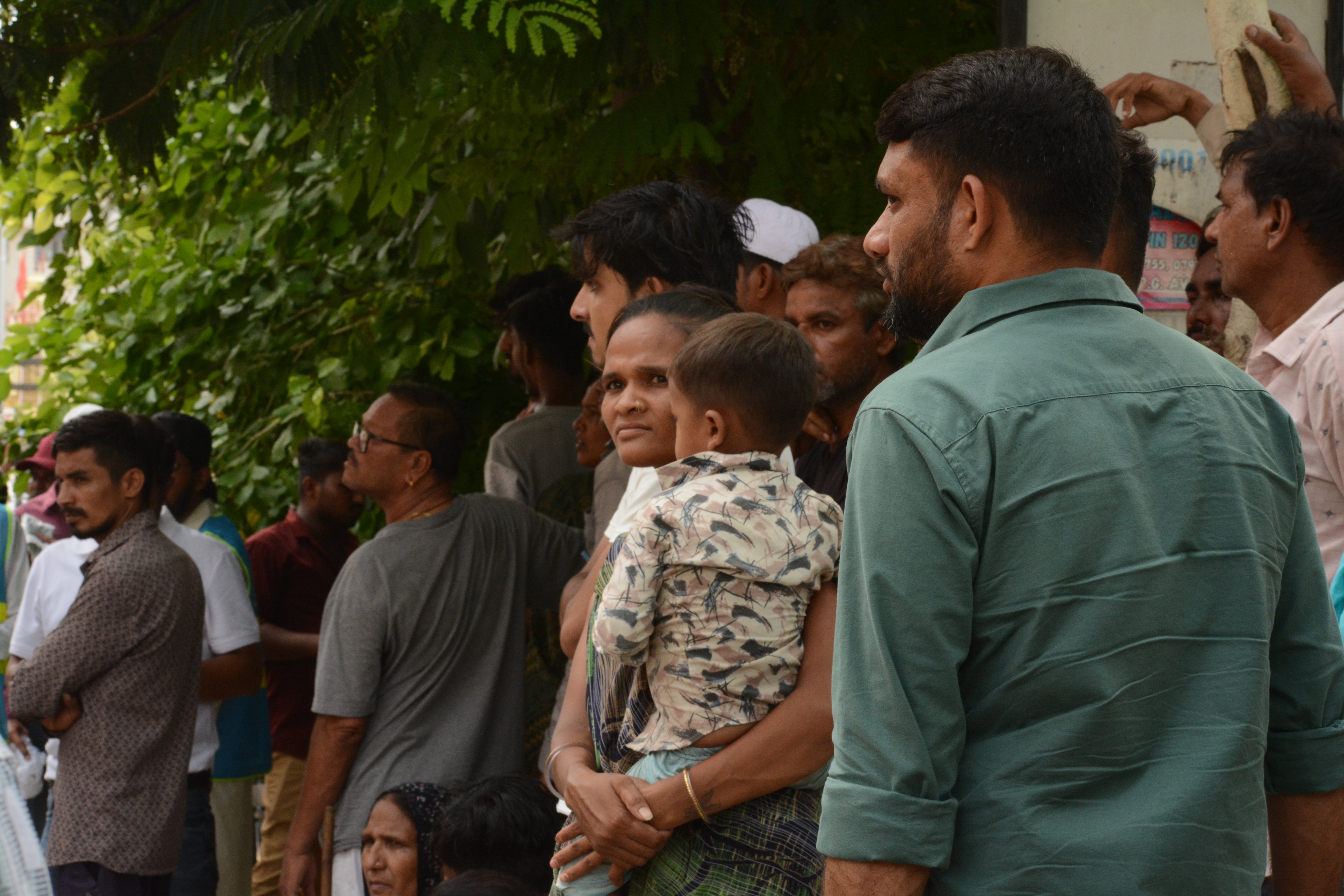 Scores of people outside the Civil Hospital’s post-mortem room await information on their loved ones