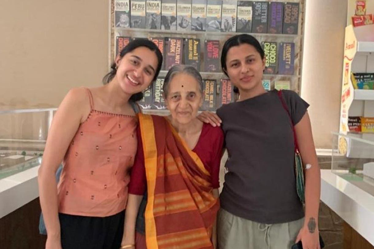 Heer, left, and Dhir Baxi, with their grandmother before the Gatwick-bound Air India flight that crashed (Family handout/PA)