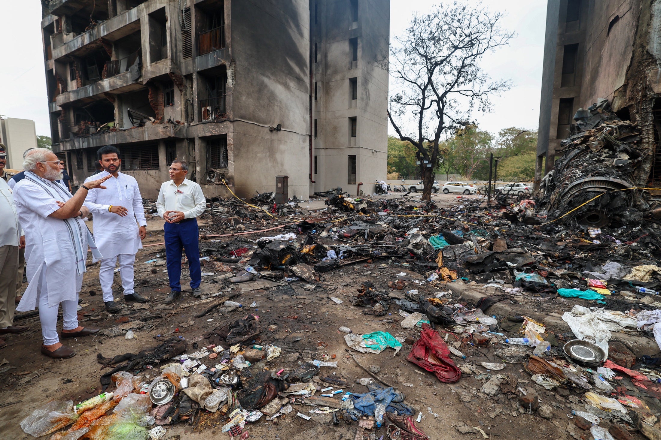 India's Prime Minister Narendra Modi visiting the site after Air India flight 171 crashed in a residential area near the airport in Ahmedabad