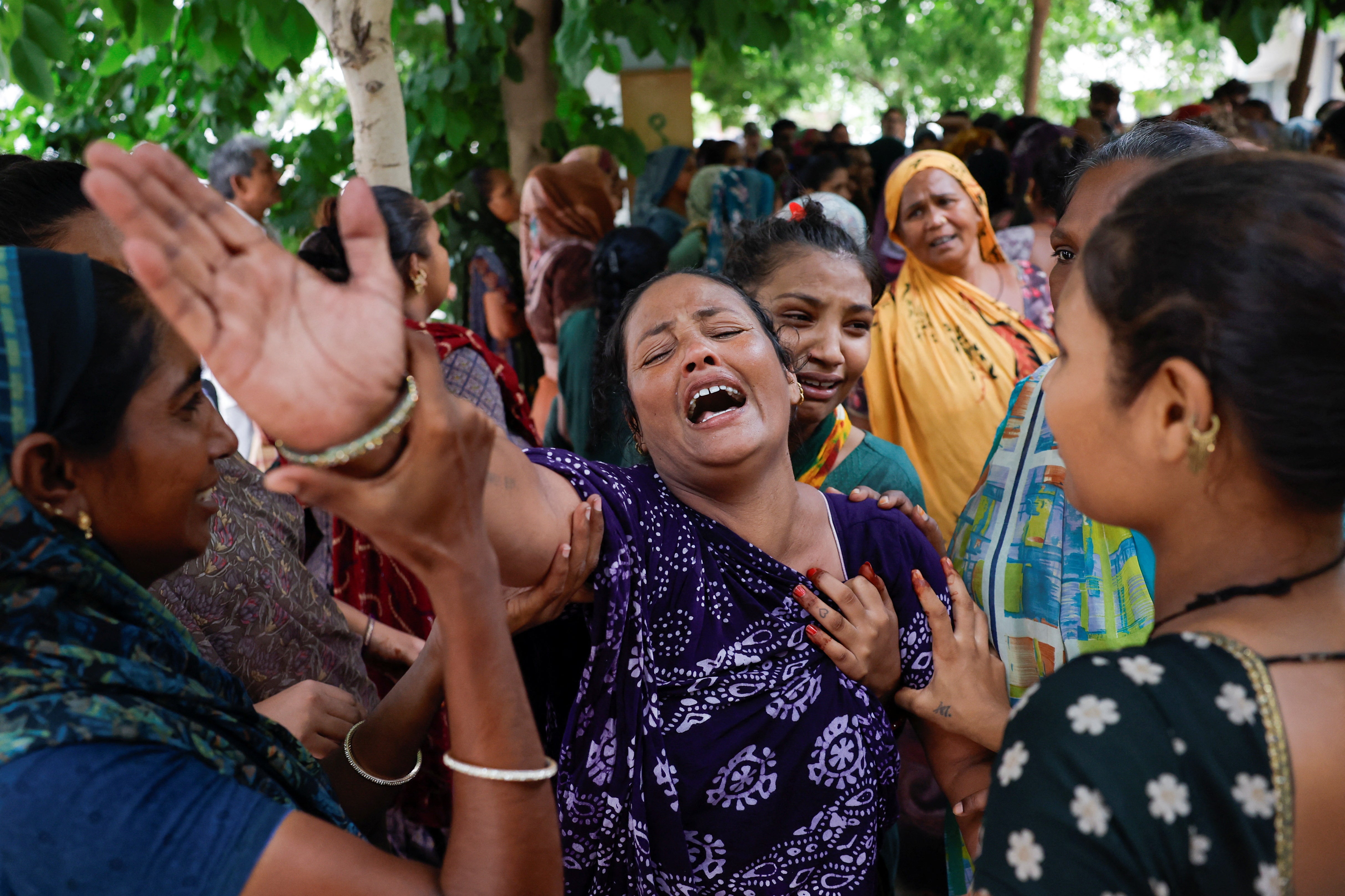 Families mourn the loss of their loved ones in India