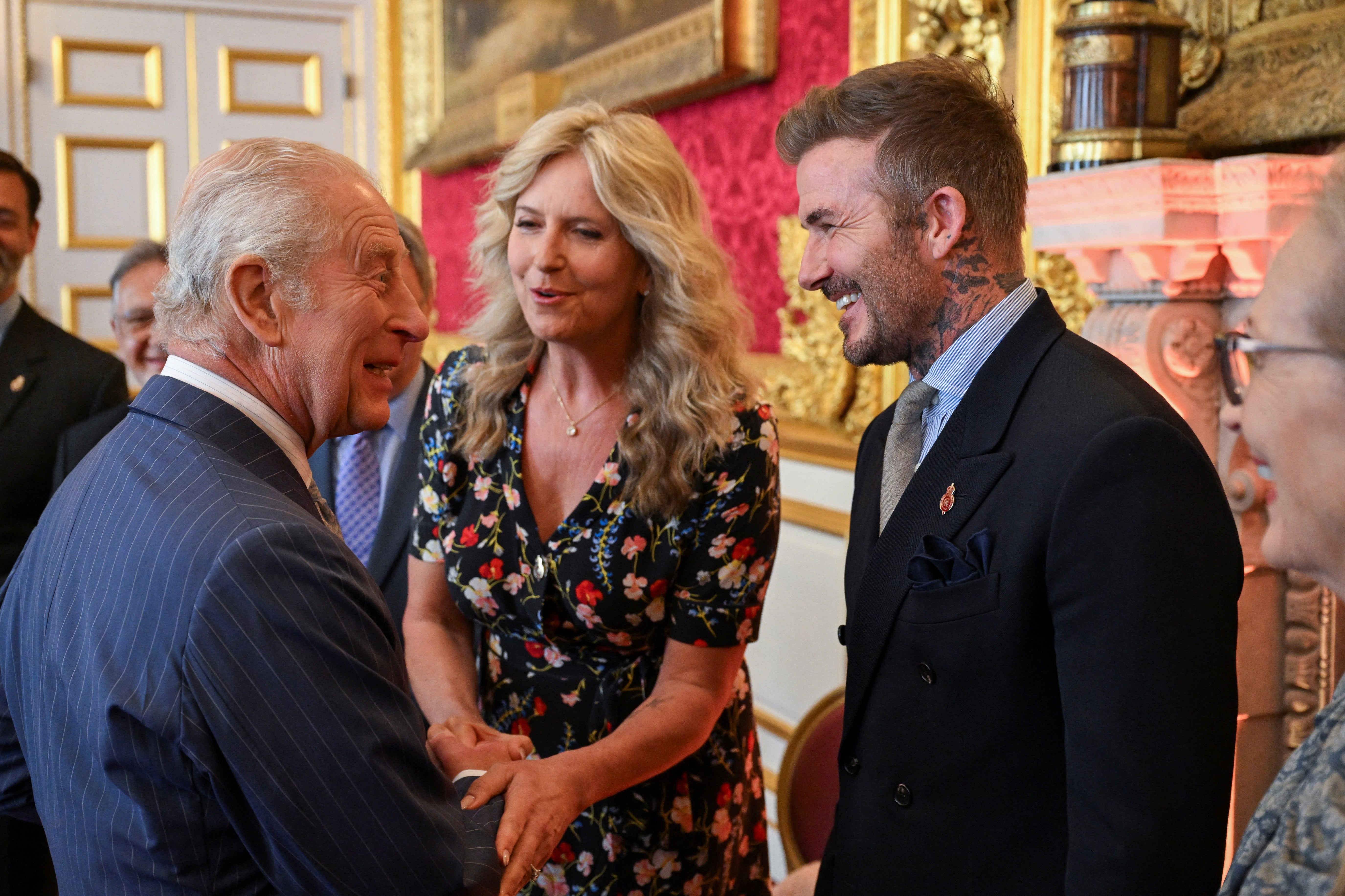 The King speaks to, from left, Penny Lancaster, David Beckham and Meryl Streep during the King’s Foundation Awards ceremony (Chris Ratcliffe/PA)
