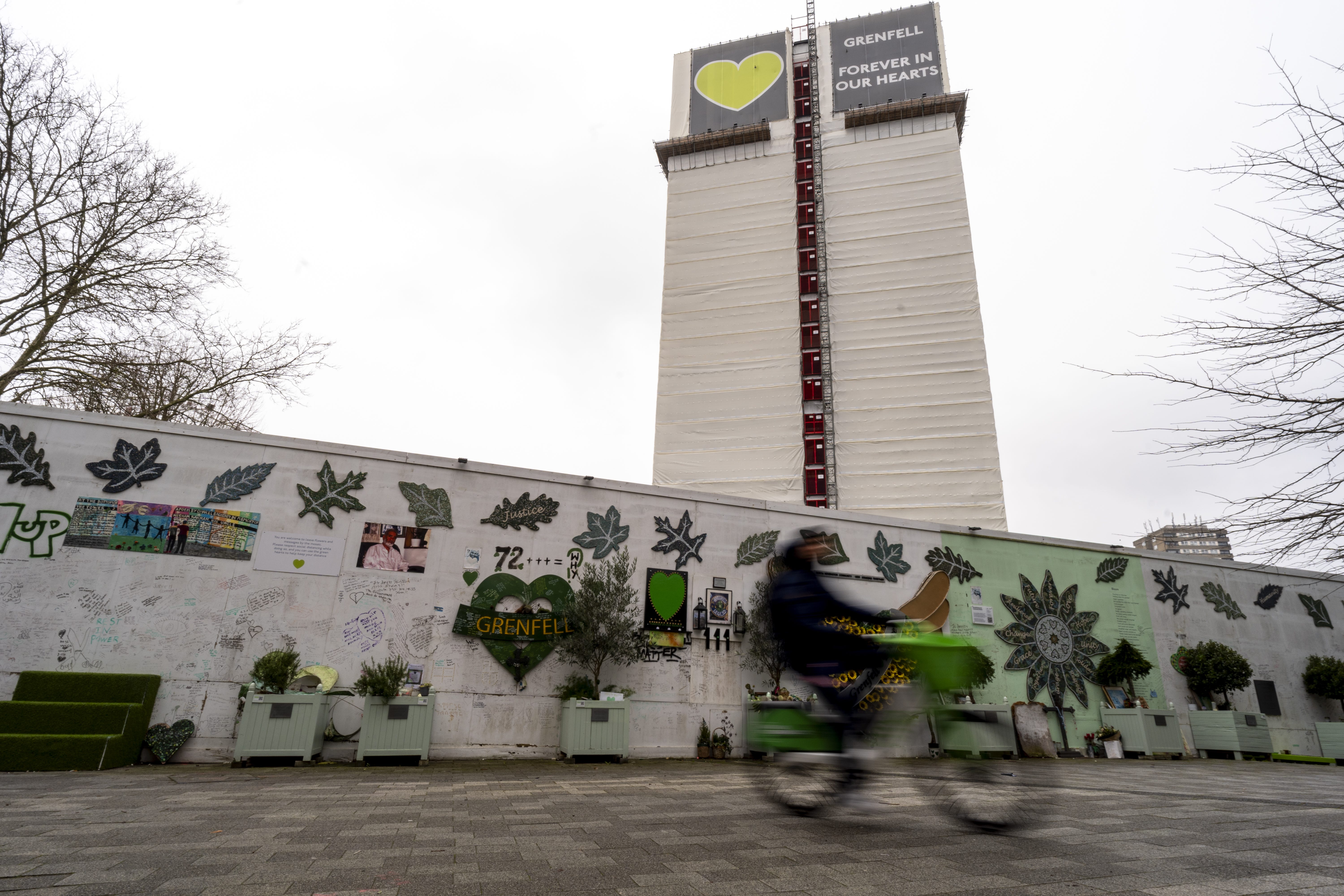 The memorial beneath Grenfell Tower in west London (Jordan Pettitt/PA)