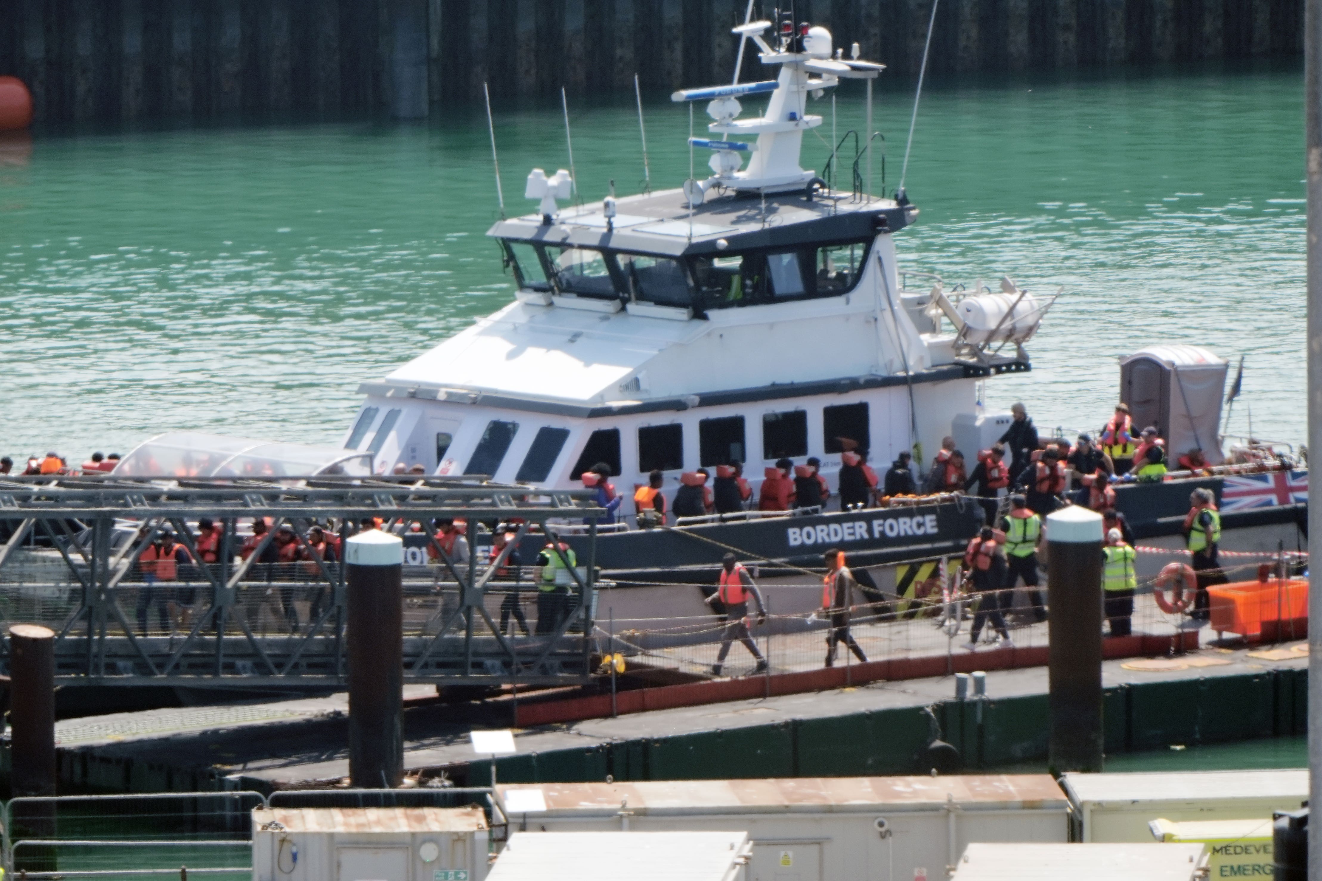 A group of people thought to be migrants are brought in to Dover (Gareth Fuller/PA)