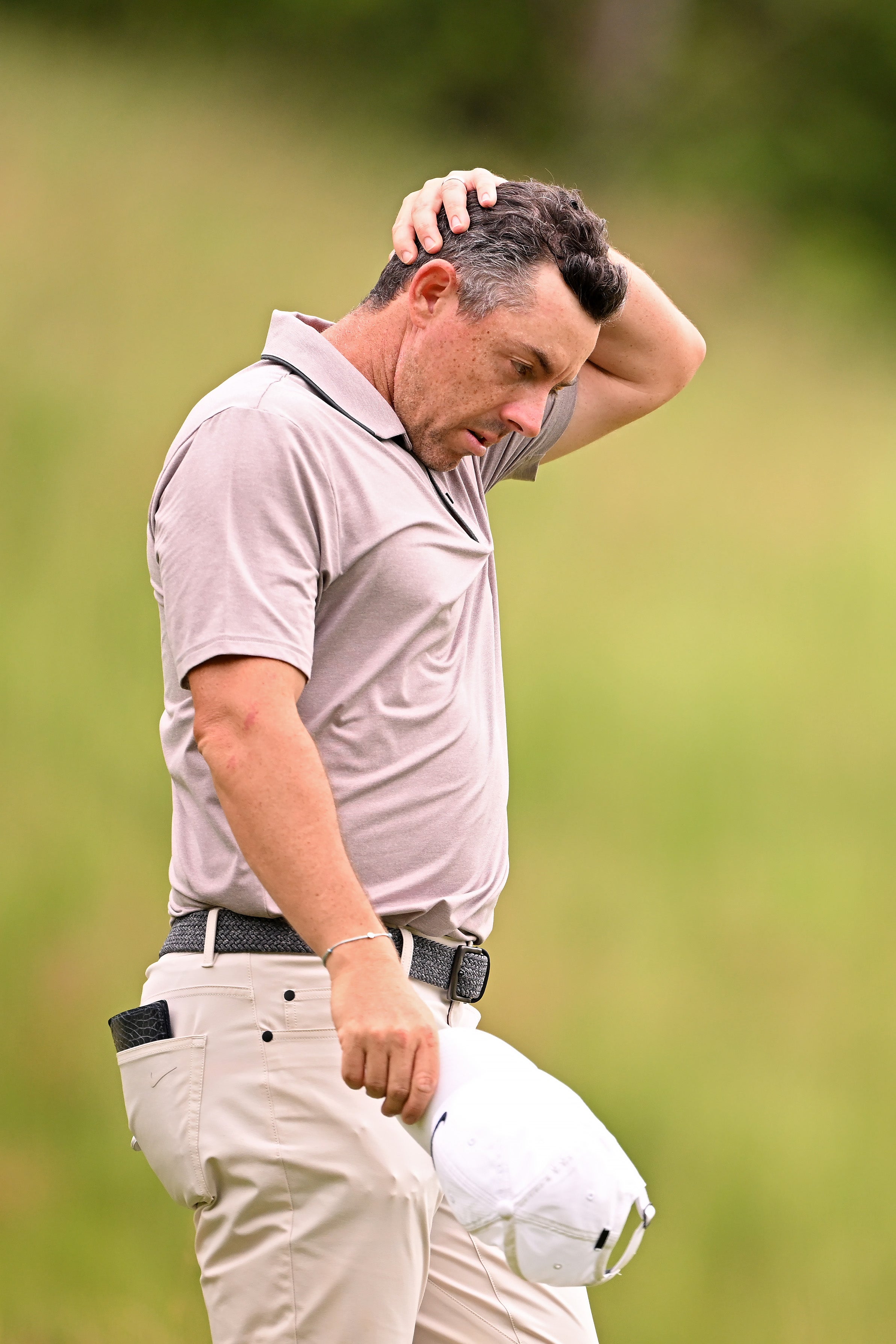 Rory McIlroy of Northern Ireland walks off the seventh tee