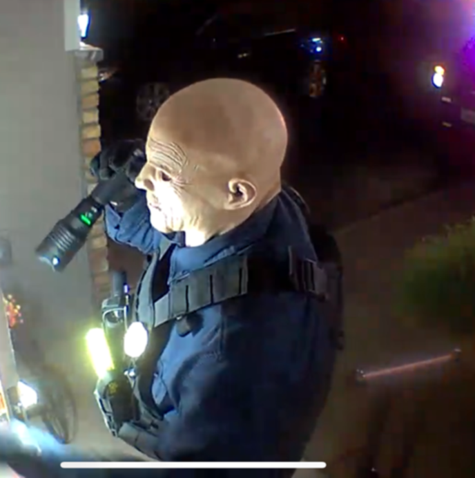 The shooter posed as a police officer and wore a face mask outside the victims' door