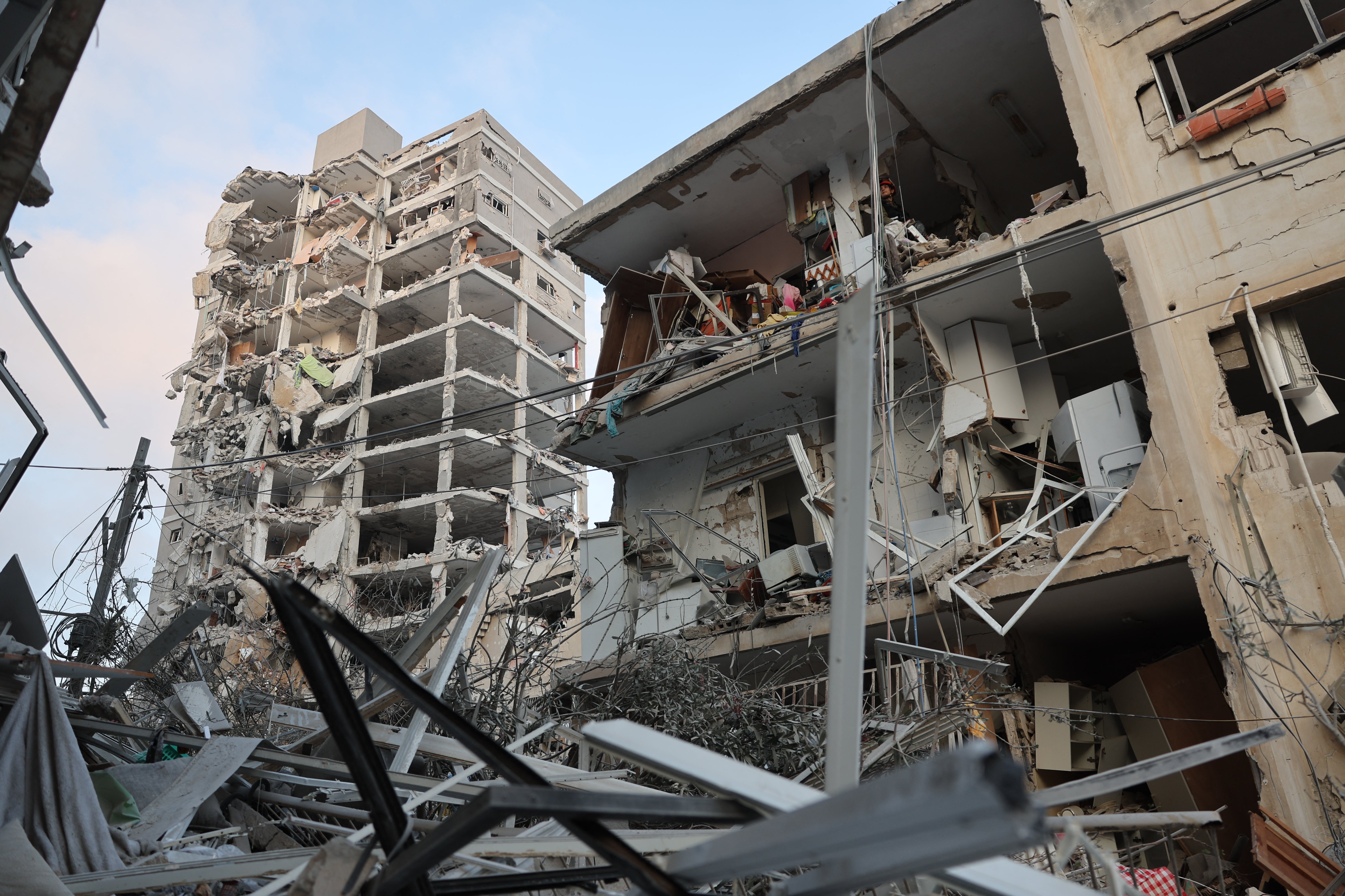 Damaged buildings are seen following a strike by an Iranian missile in the Israeli city of Bat Yam, south of Tel Aviv, early on June 15, 2025.