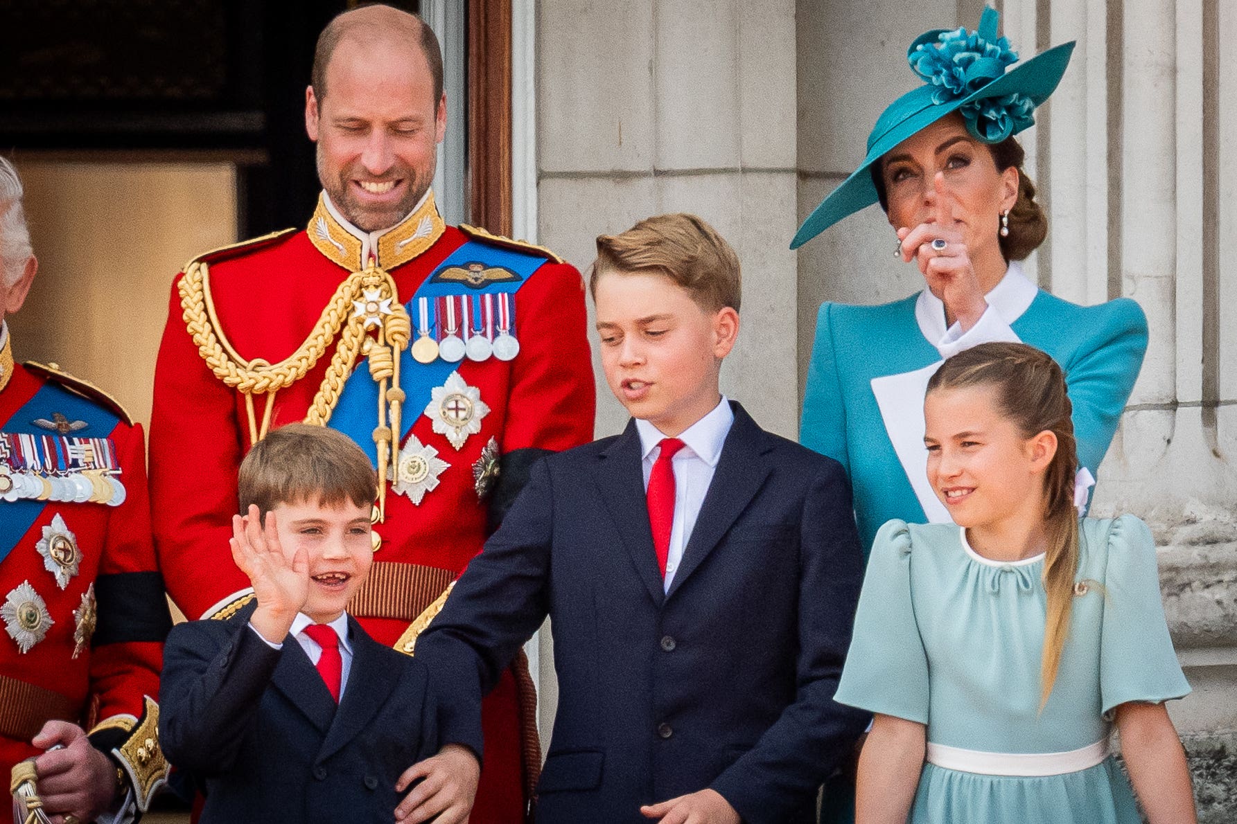 Prince Louis, the Prince of Wales, Prince George, the Princess of Wales and Princess Charlotte on the balcony of Buckingham Palace