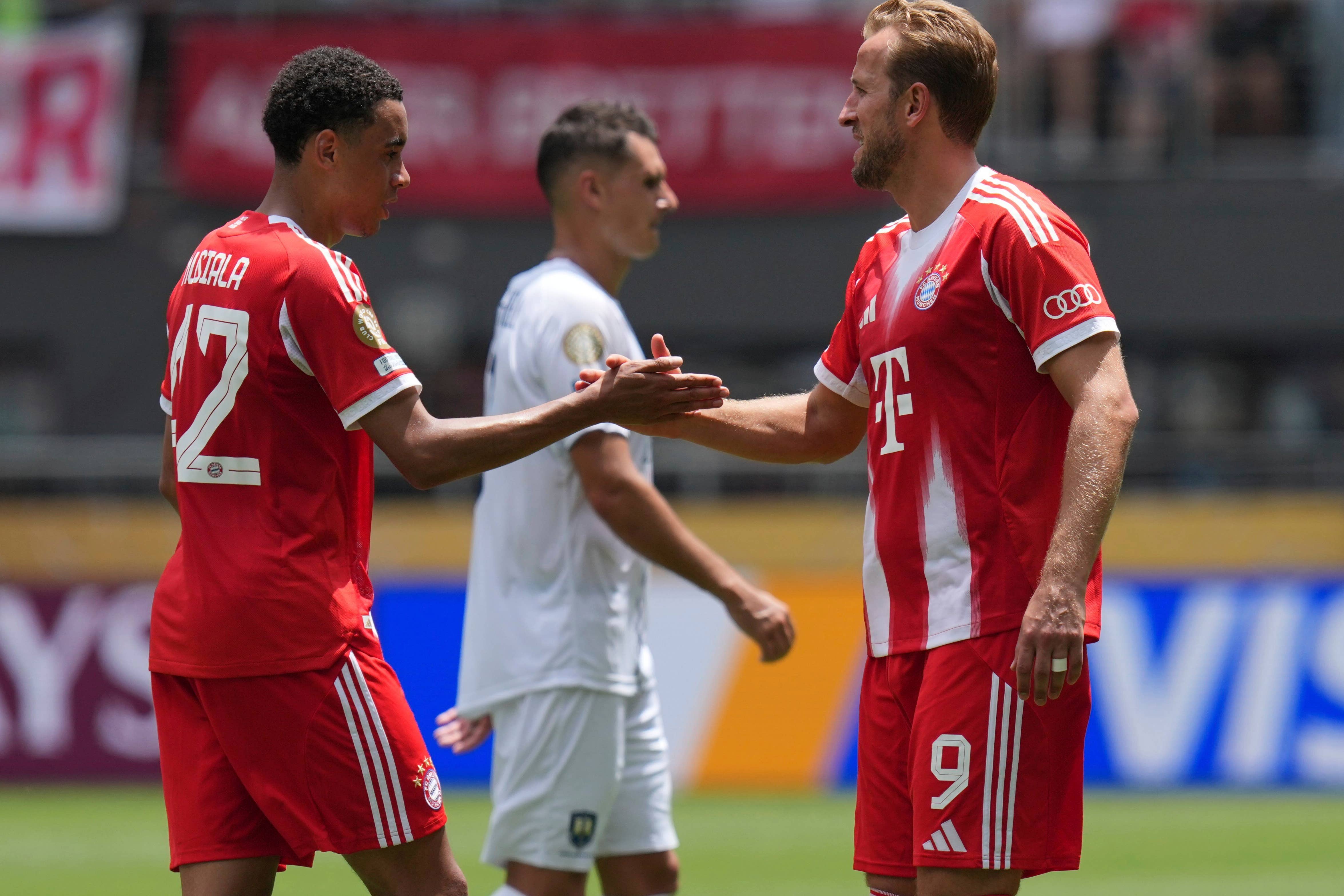 Jamal Musiala, left, hit a hat-trick after replacing Harry Kane (Joshua A. Bickel/AP)