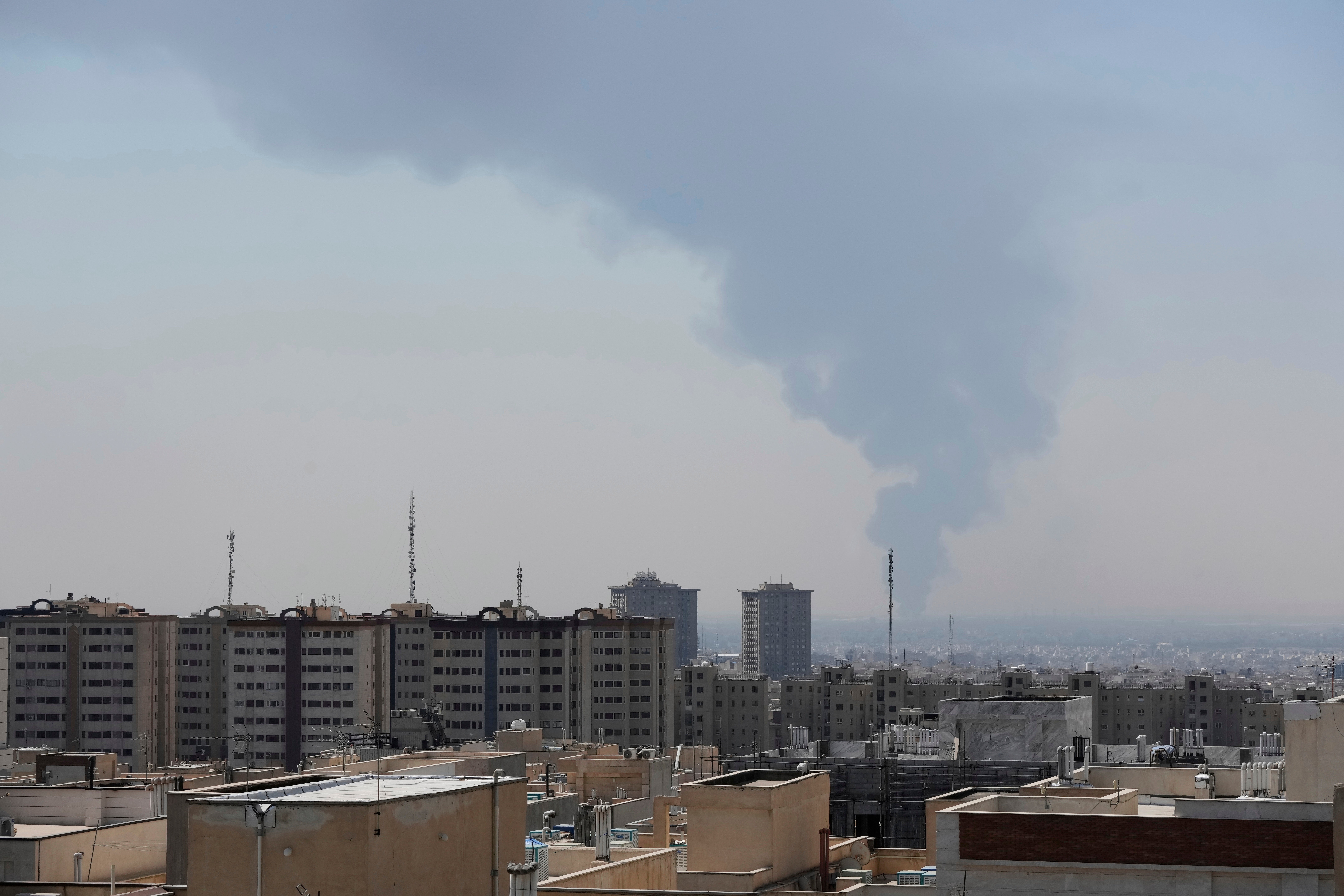 Smoke rises from an oil facility after a Saturday explosion in southern Tehran