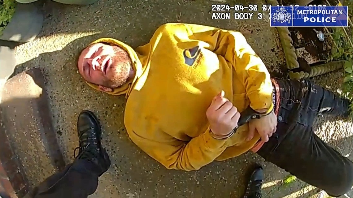 A still from footage of Monzo being arrested after being tasered