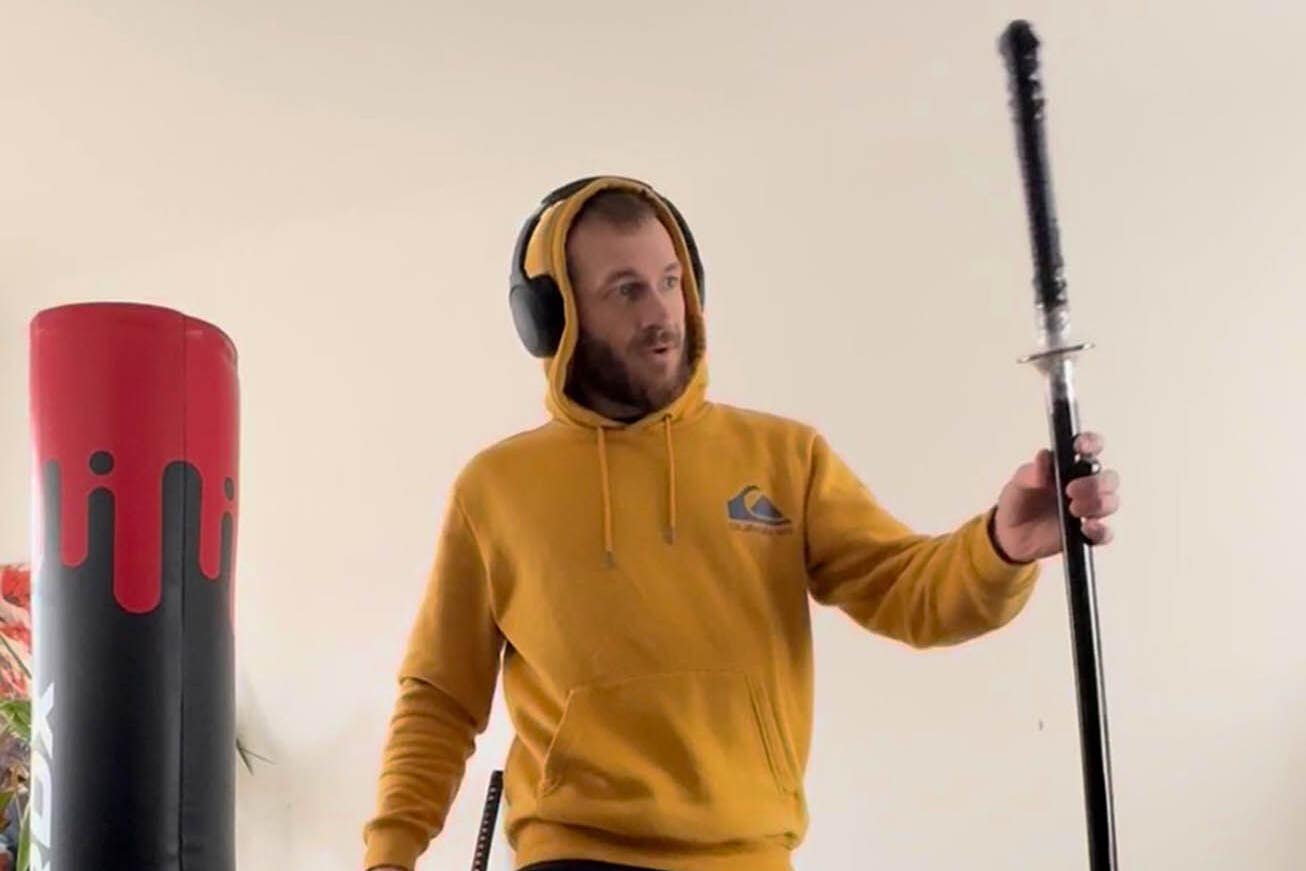 Marcus Arduini Monzo with a samurai sword that was shown to the jury in his trail at the Old Bailey (Metropolitan Police/PA)