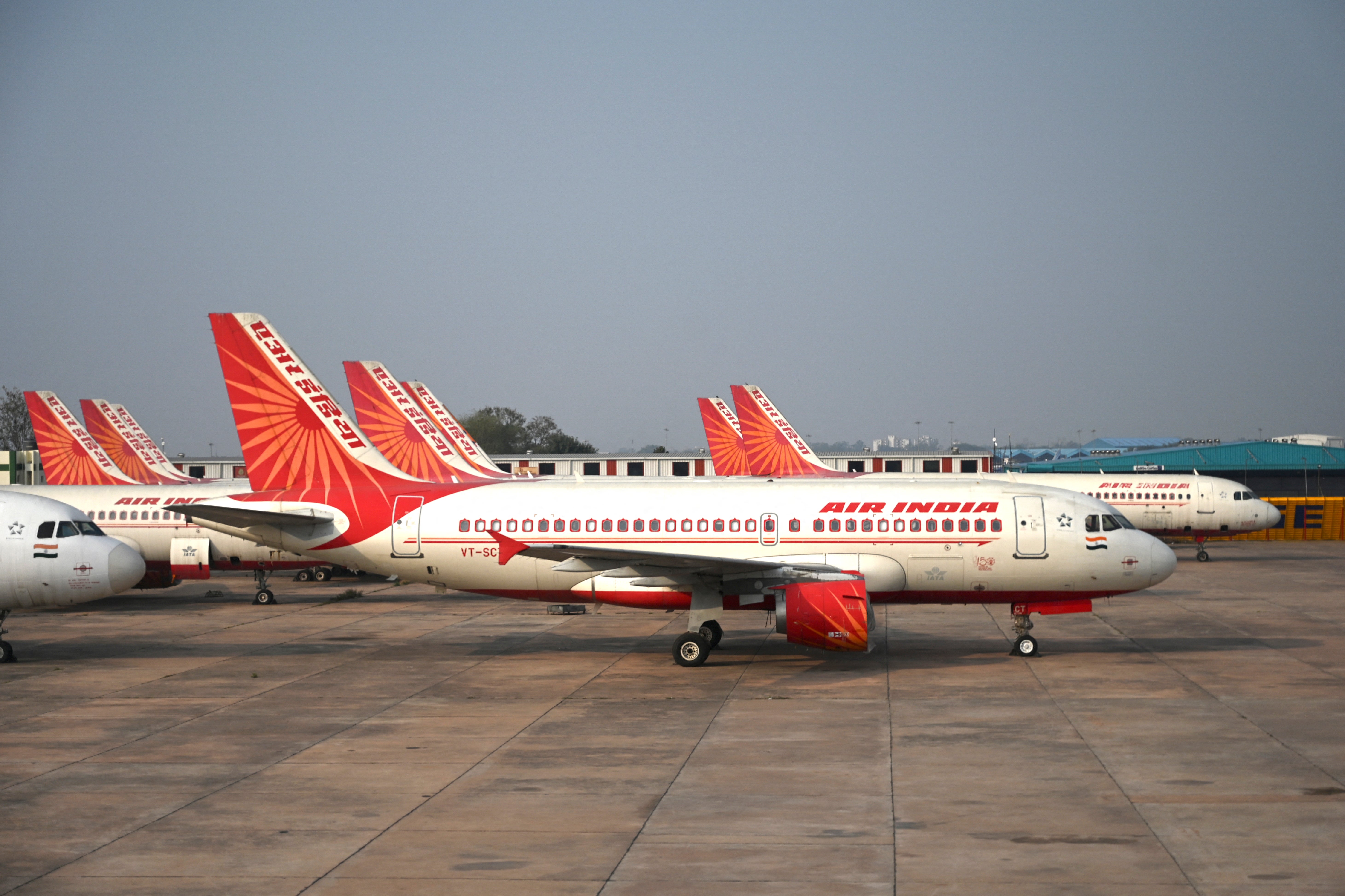 Air India planes sit on the tarmac at the Delhi airport