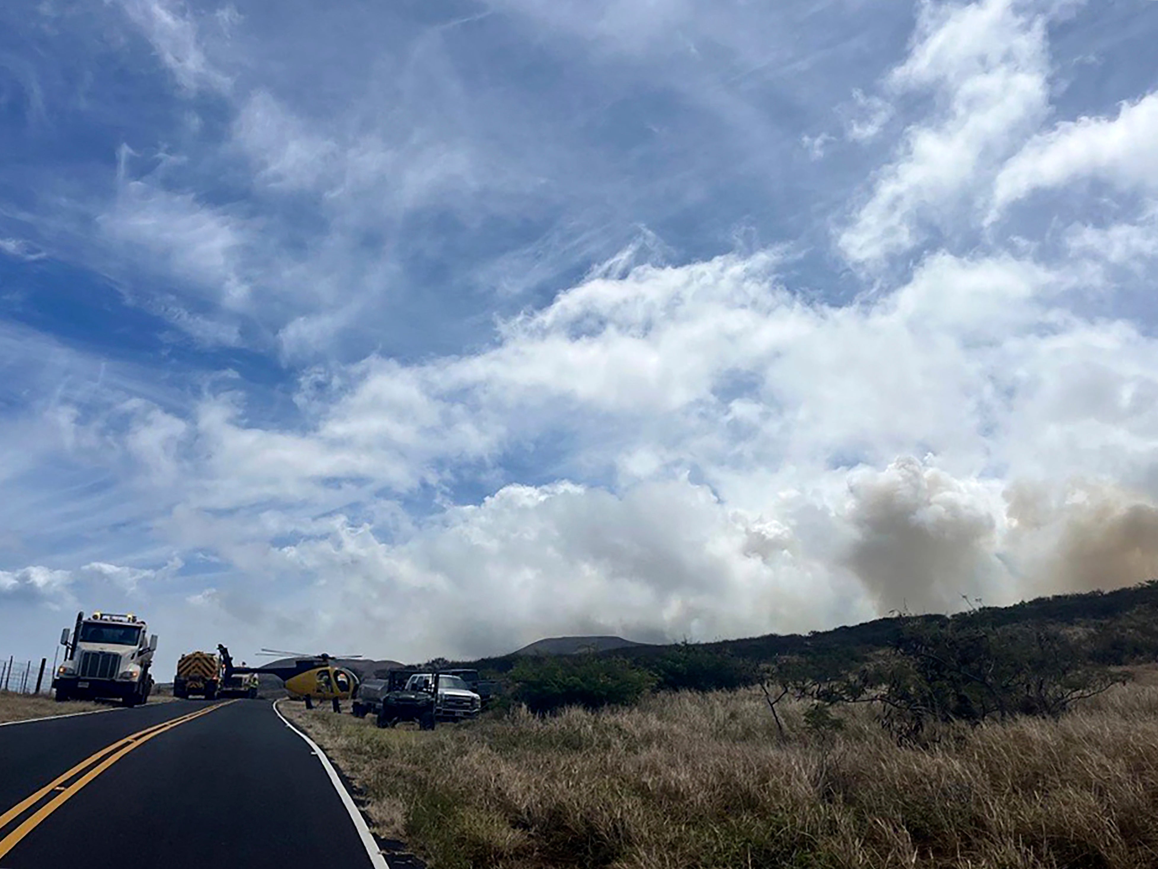 Fast-moving brush fire on Hawaii's Maui island evacuates about 50 people. No structures have burned