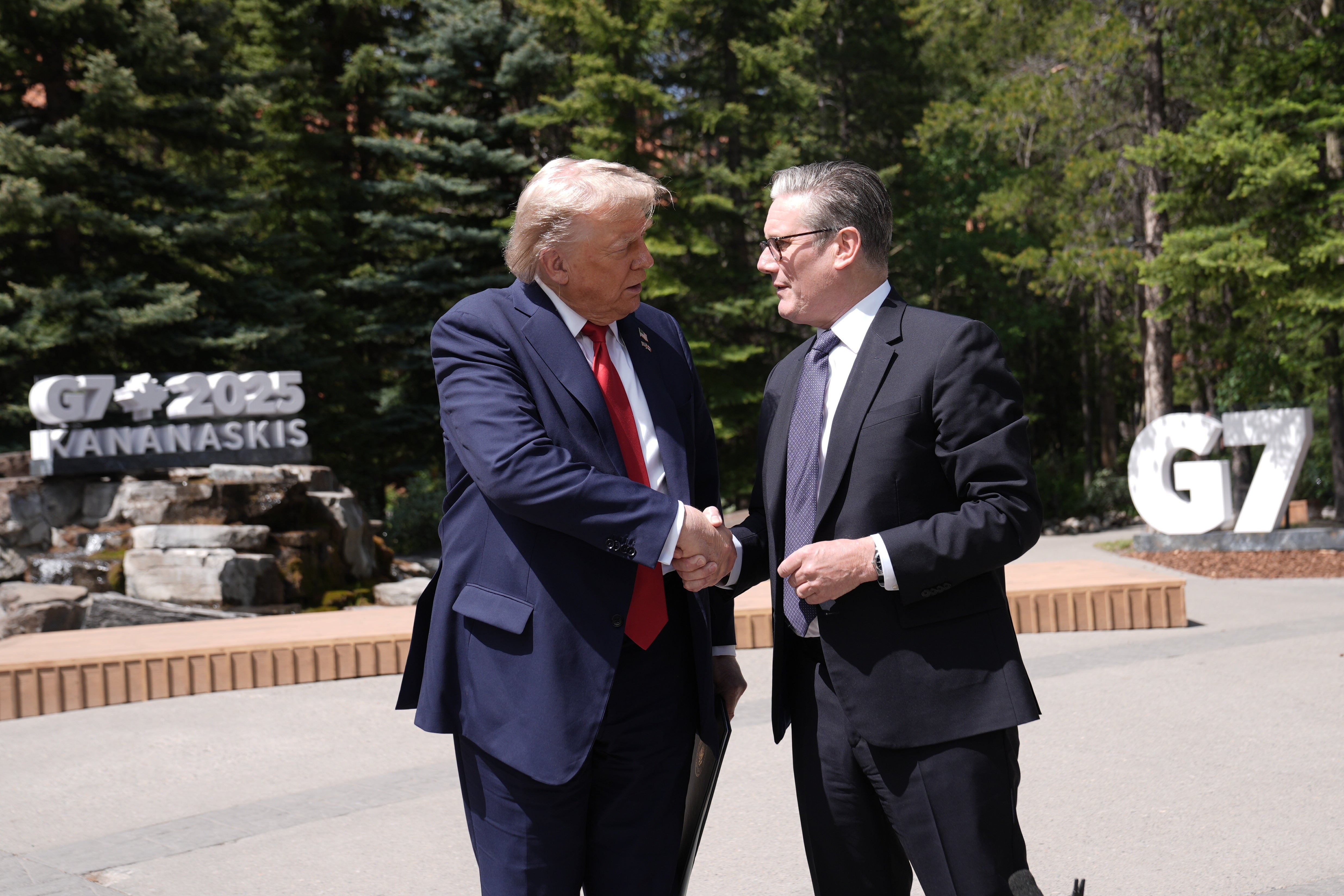 US President Donald Trump (left) shakes hands with Prime Minister Sir Keir Starmer