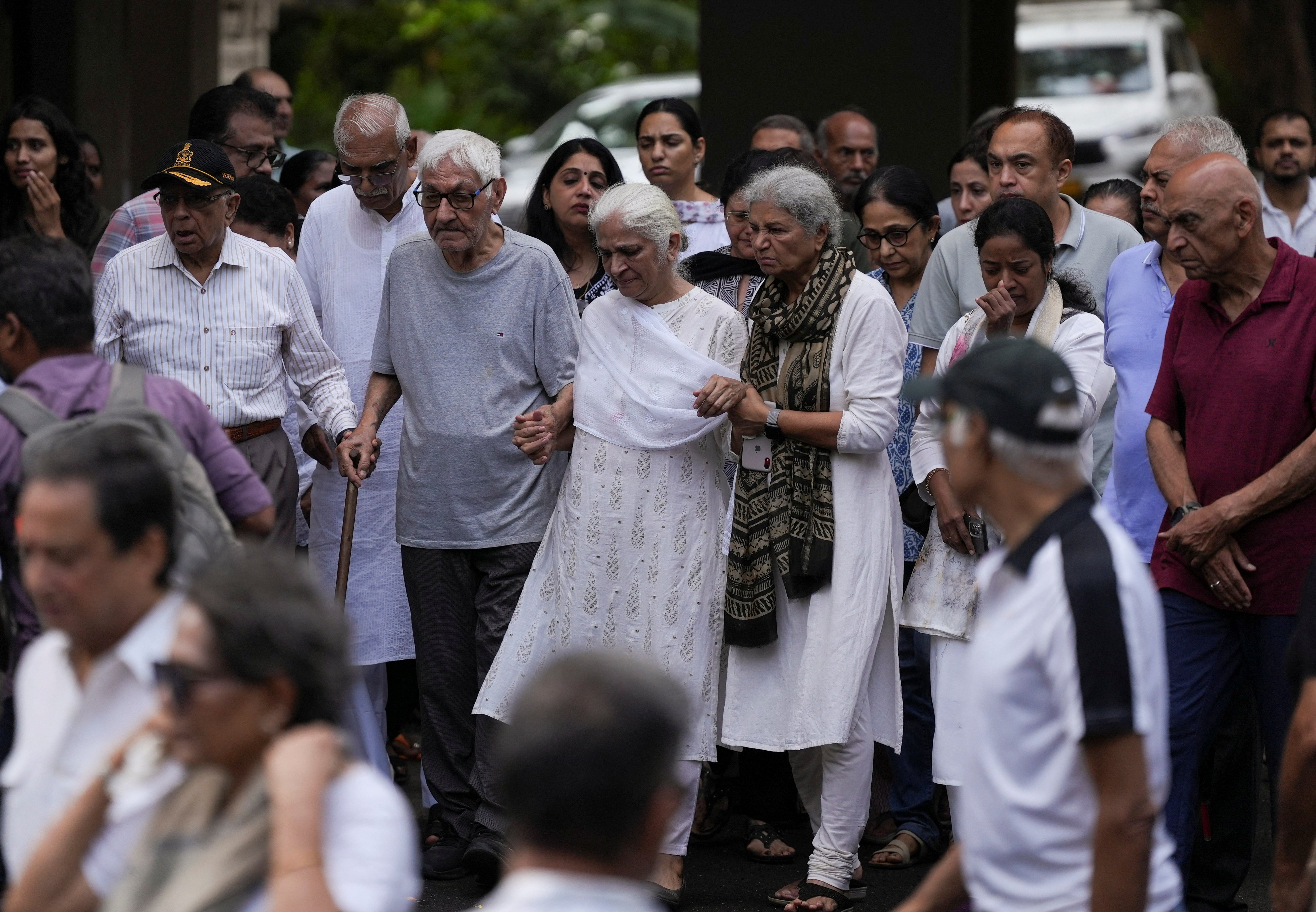 Mother and father of Sumeet Sabharwal at the funeral of their son Sumeet