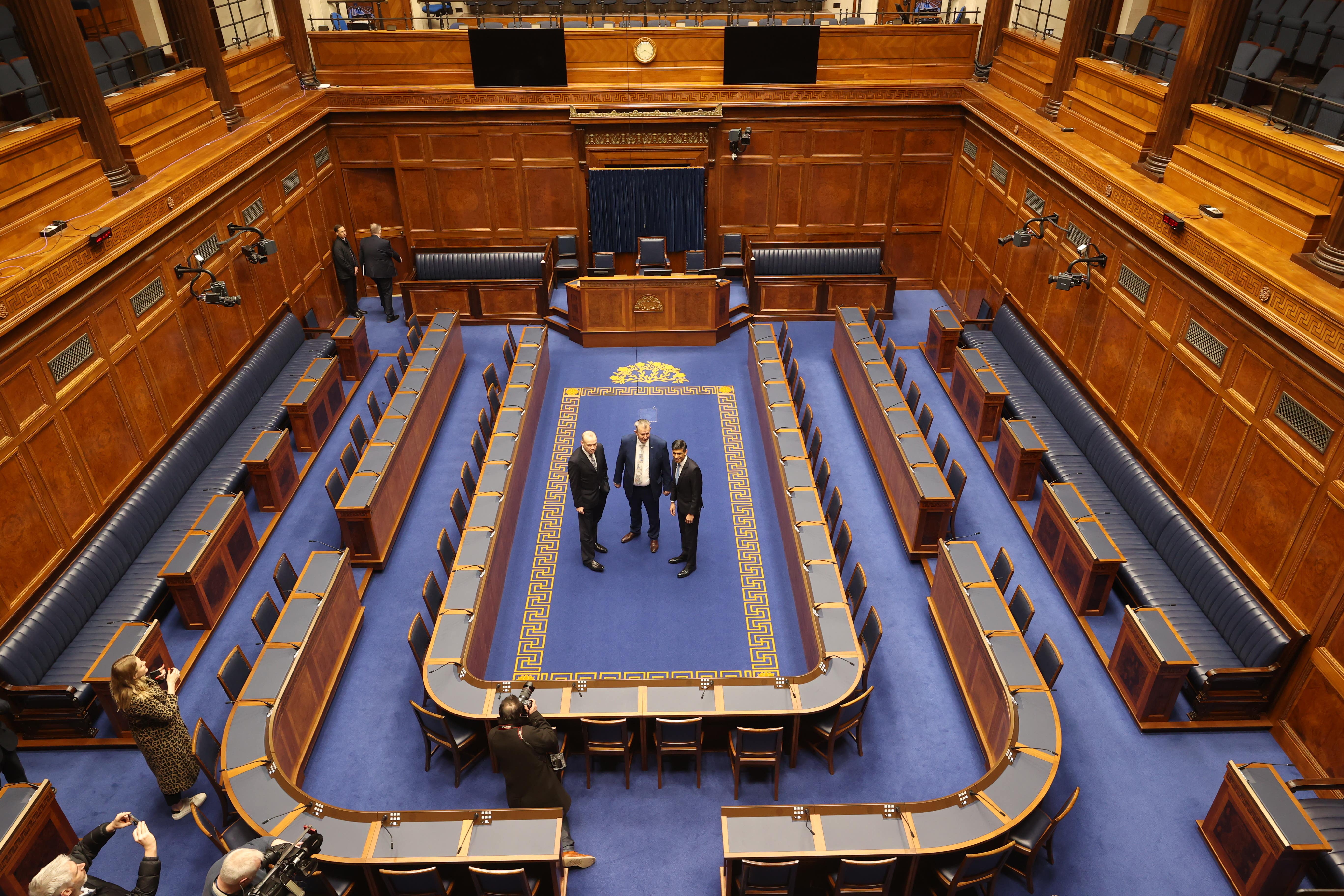 Former Northern Ireland secretary Chris Heaton-Harris, Speaker Edwin Poots and then prime minister Rishi Sunak in the Assembly Chamber in 2024 (Liam McBurney/PA)