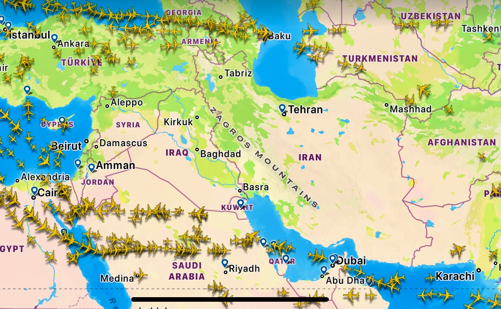 Off limits: Flightradar24 map of aircraft in flight in the Middle East region, showing a large swathe of empty airspace over Iran, Iraq and Syria