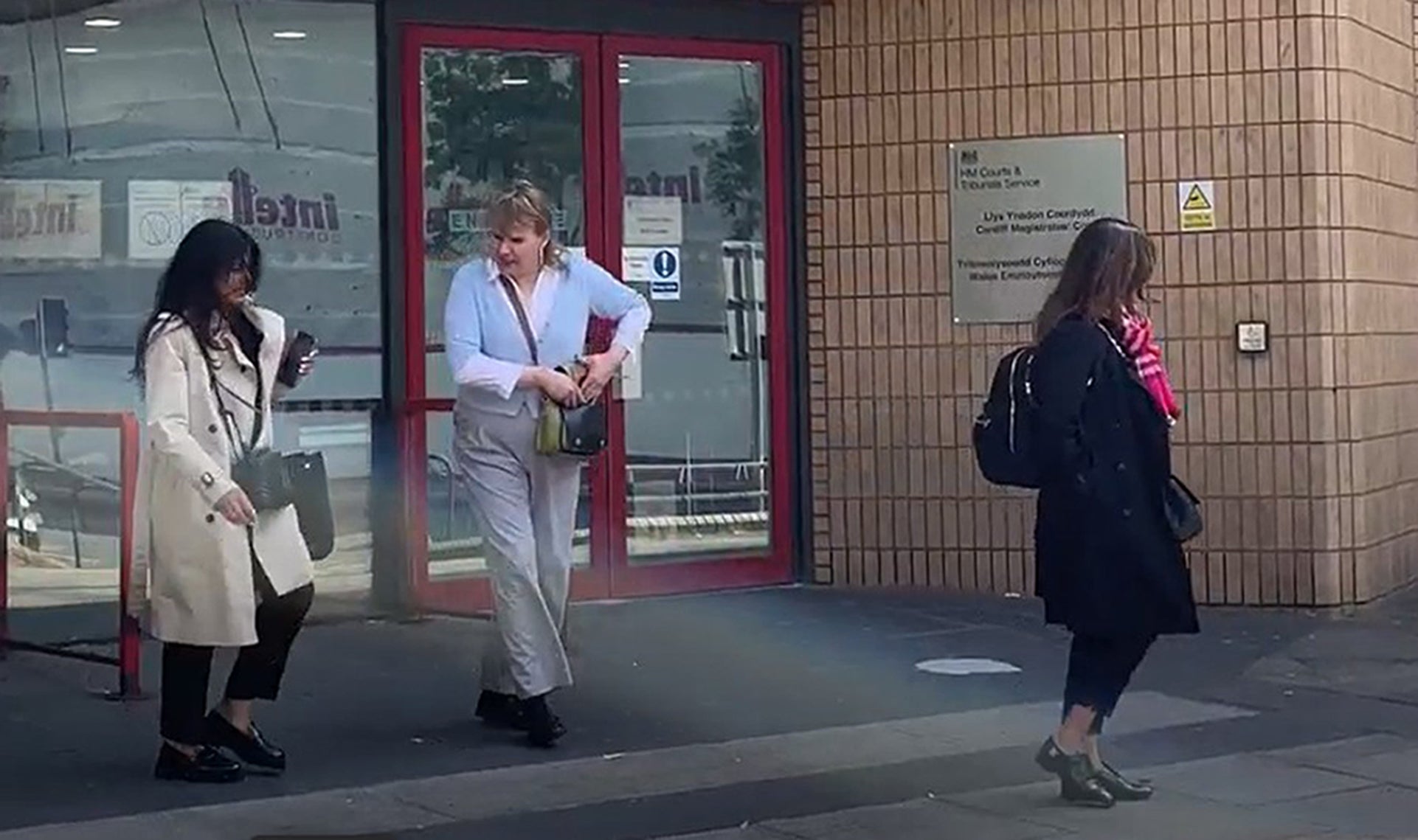 Katie Wallis, centre, leaving Cardiff Magistrates’ Court earlier this year
