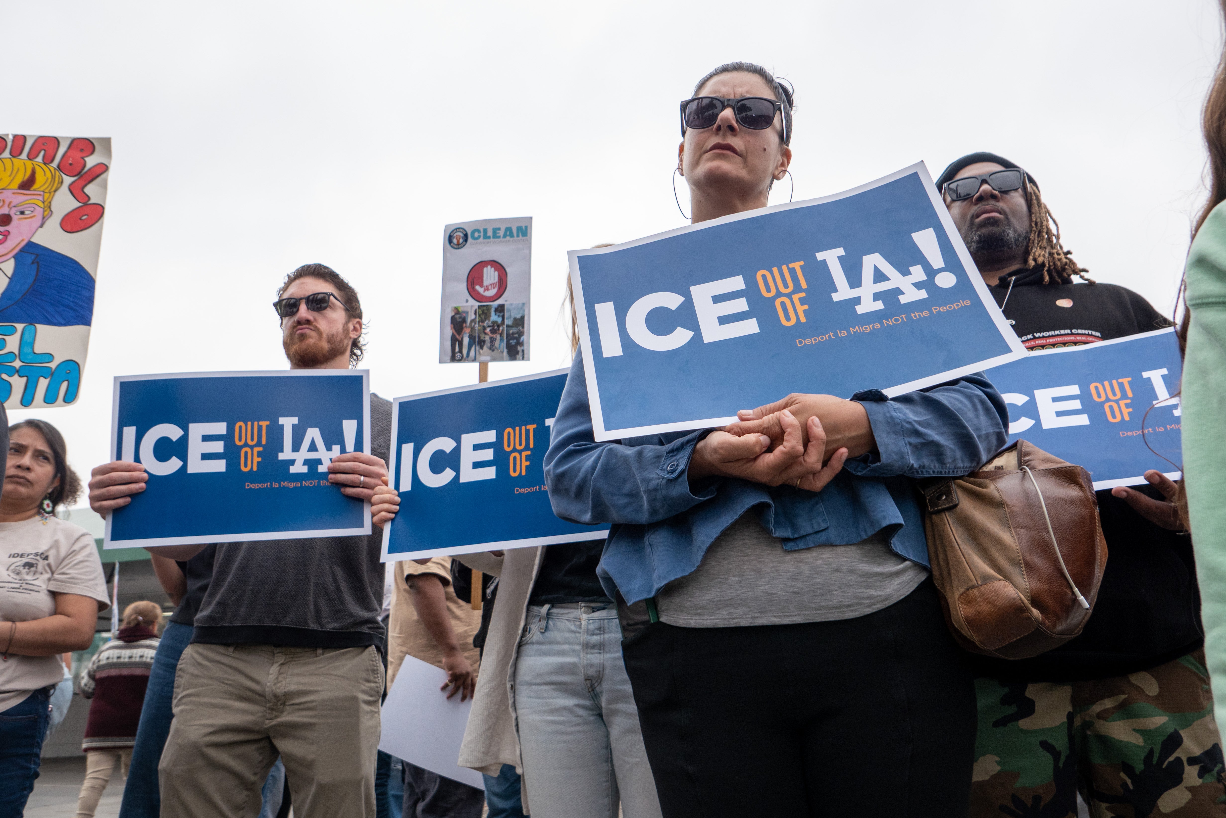 Demonstrators in Los Angeles have called on the Trump administration to withdraw ICE from communities after a series of raids sparked mass protests prompting Trump to call in the National Guard and Marines