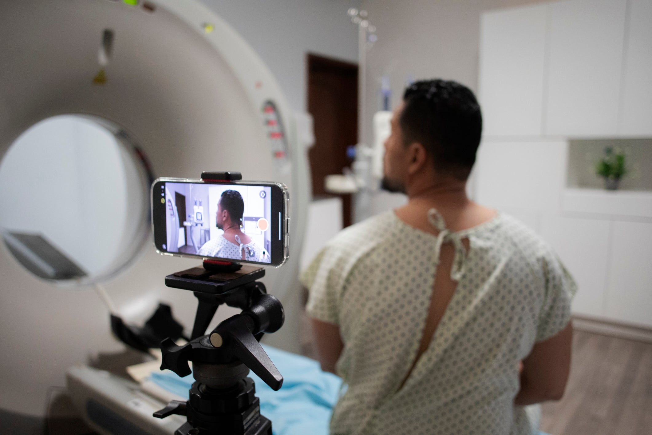 The Society of Radiographers (SoR) said filming NHS staff and treatments places undue stress on health professionals