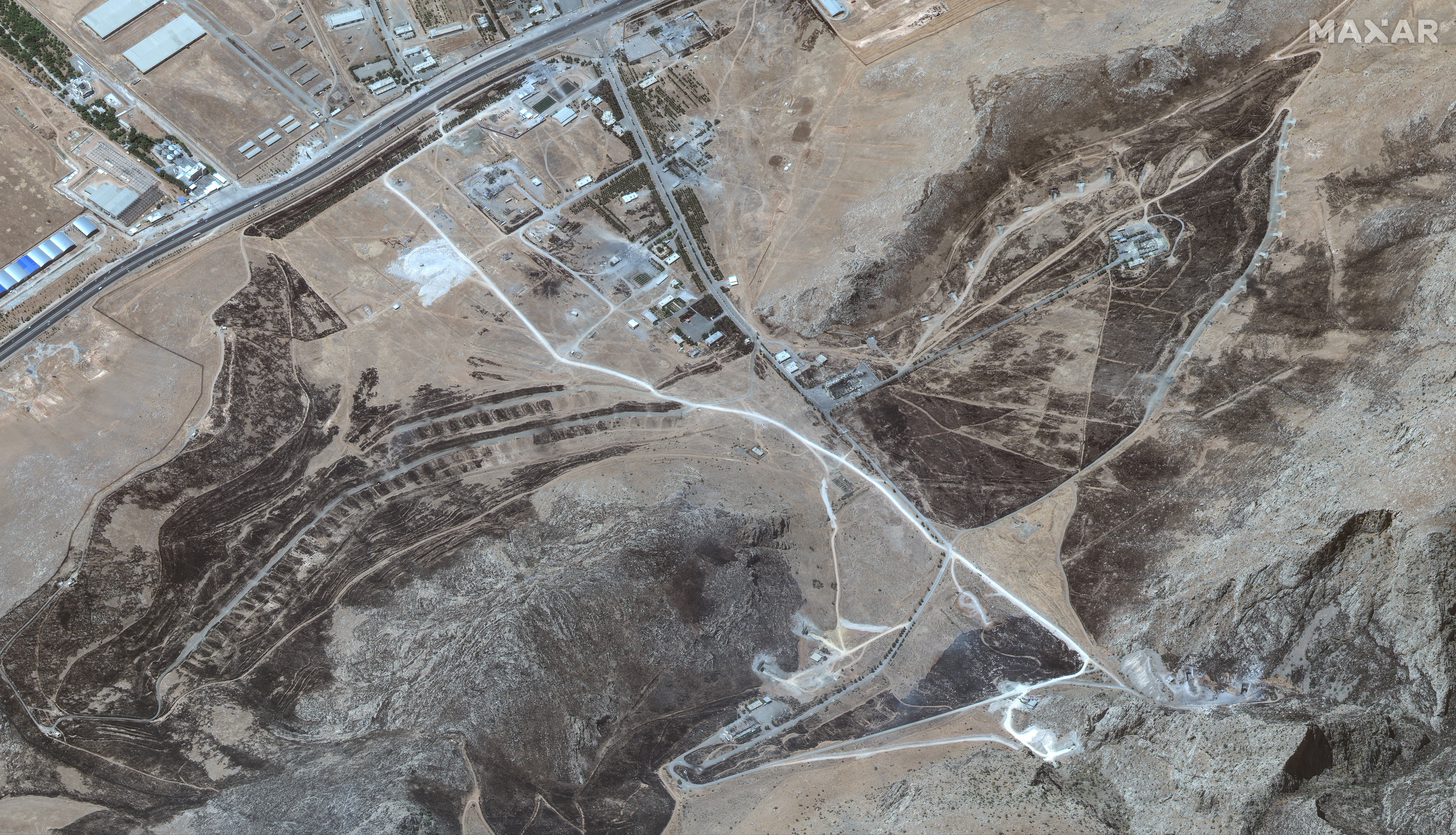 A satellite image shows the damaged Kermanshah missile facility in Iran in this handout image dated June 15, 2025