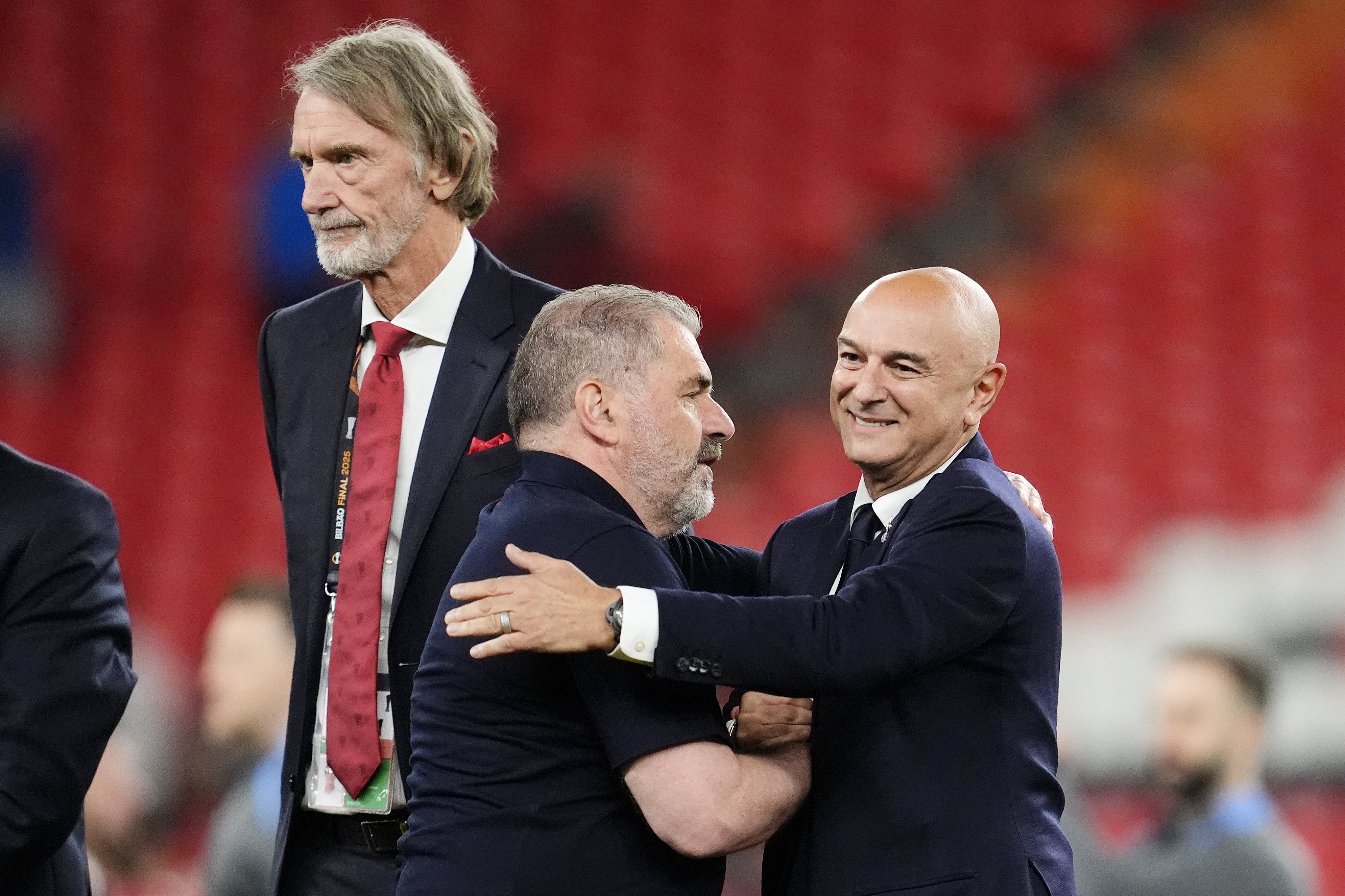 Ange Postecoglou, left, and Daniel Levy embrace following Tottenham’s Europa League final win over Manchester United (Nick Potts/PA)