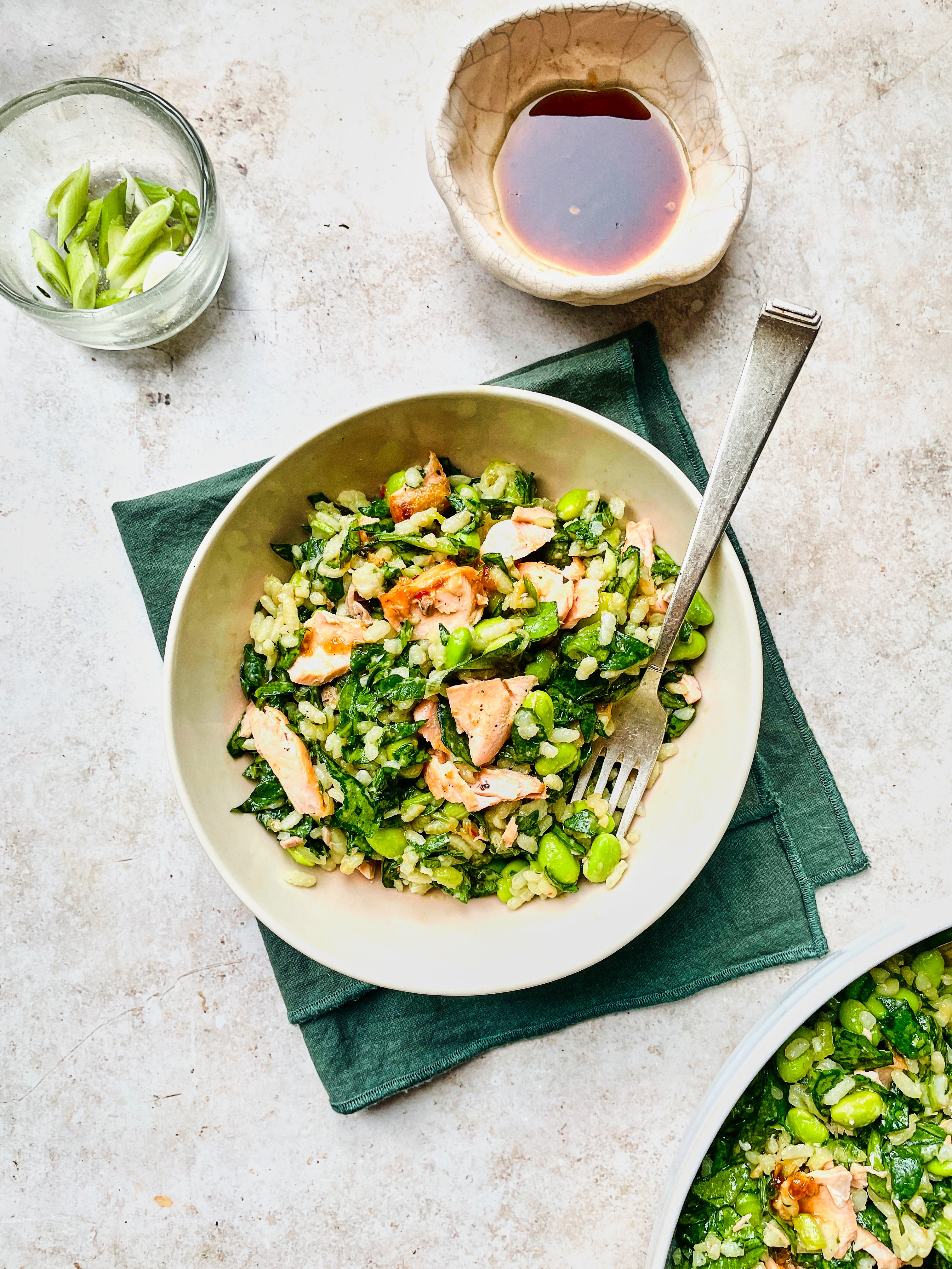 Flaky salmon, nutty rice and an edamame crunch – a satisfying summer dinner that doesn’t demand an oven