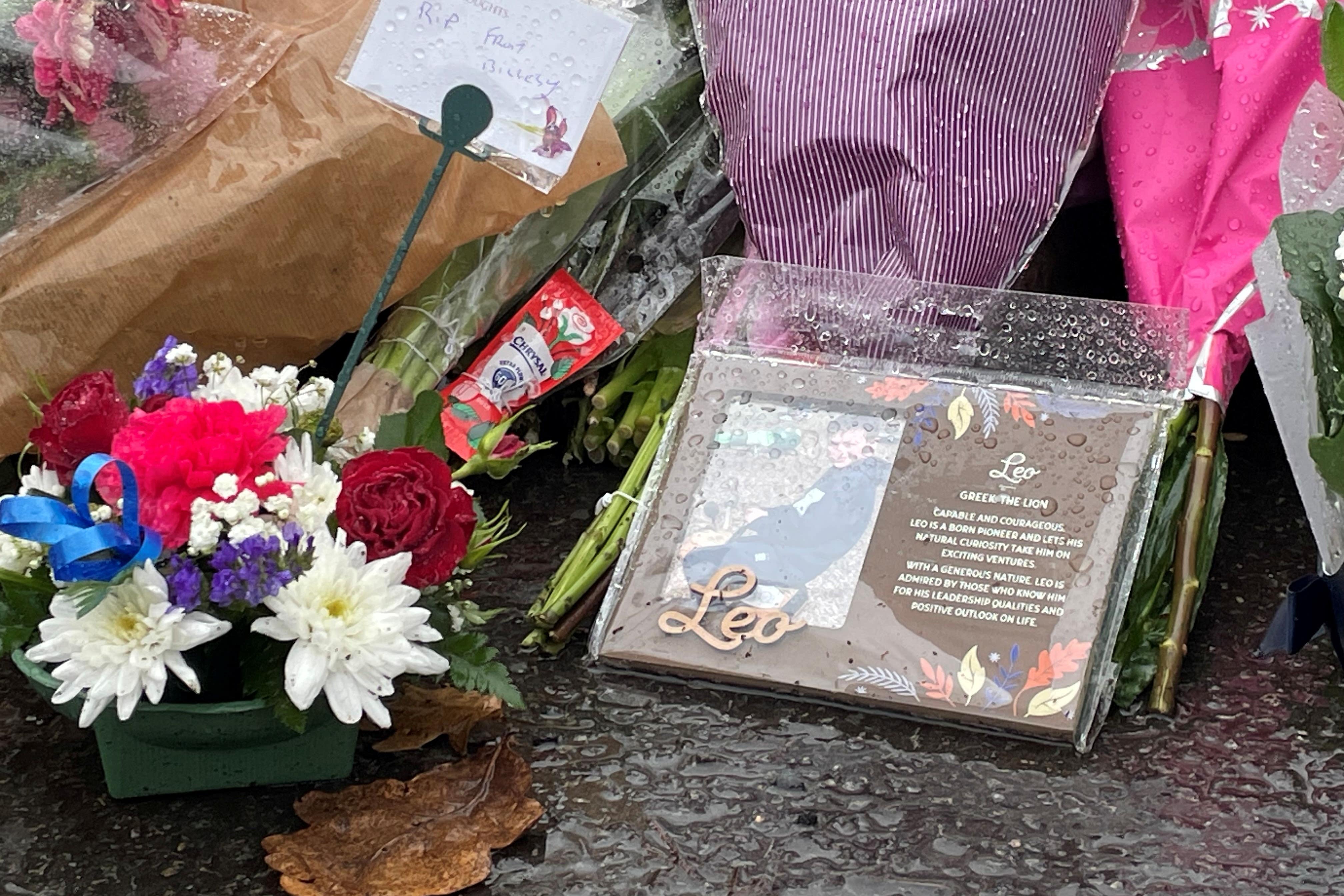 Flowers placed near the scene of the incident in Hall Green, Birmingham (PA)