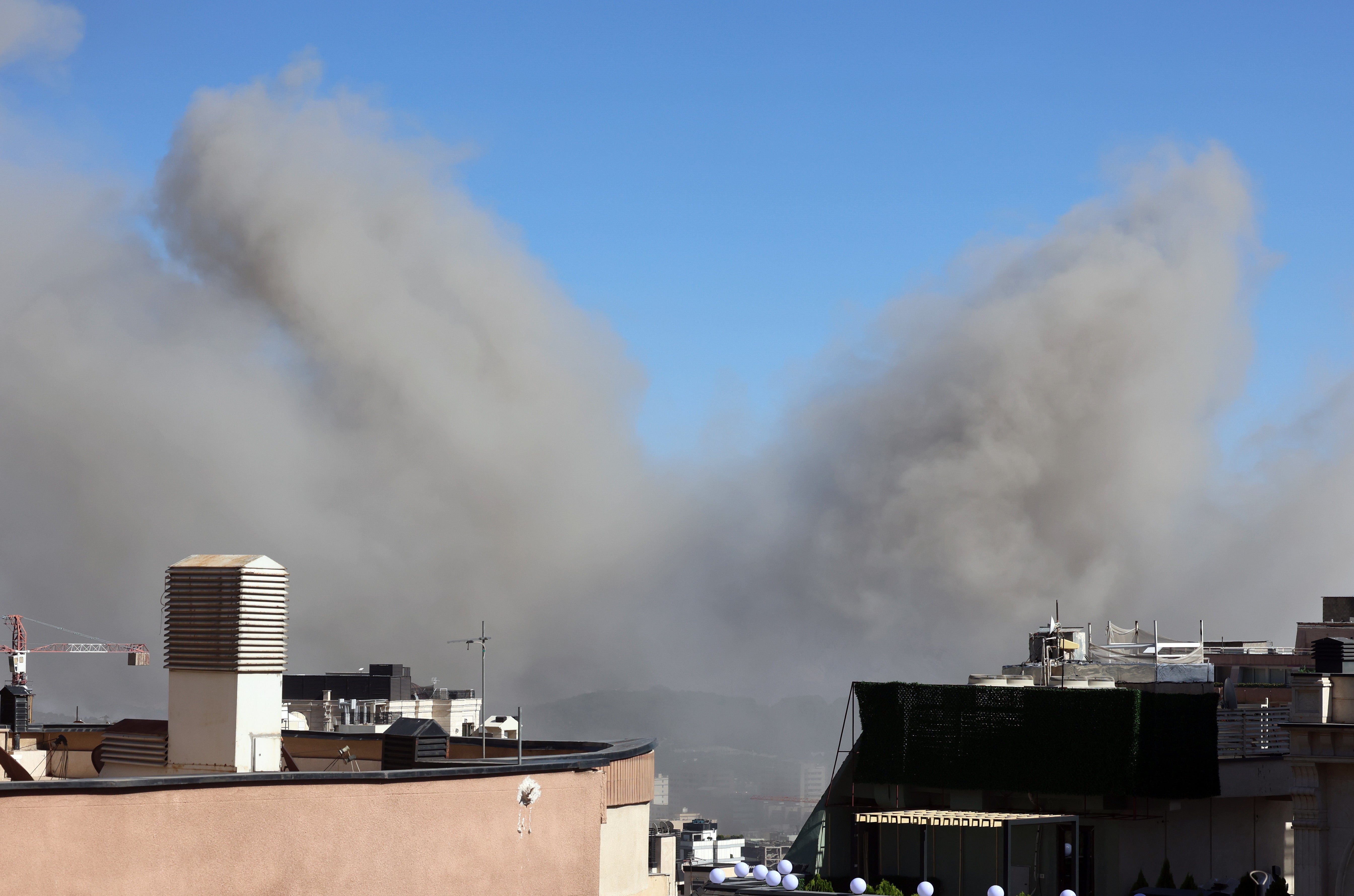 Smoke rises following an Israeli airstrike on Tehran