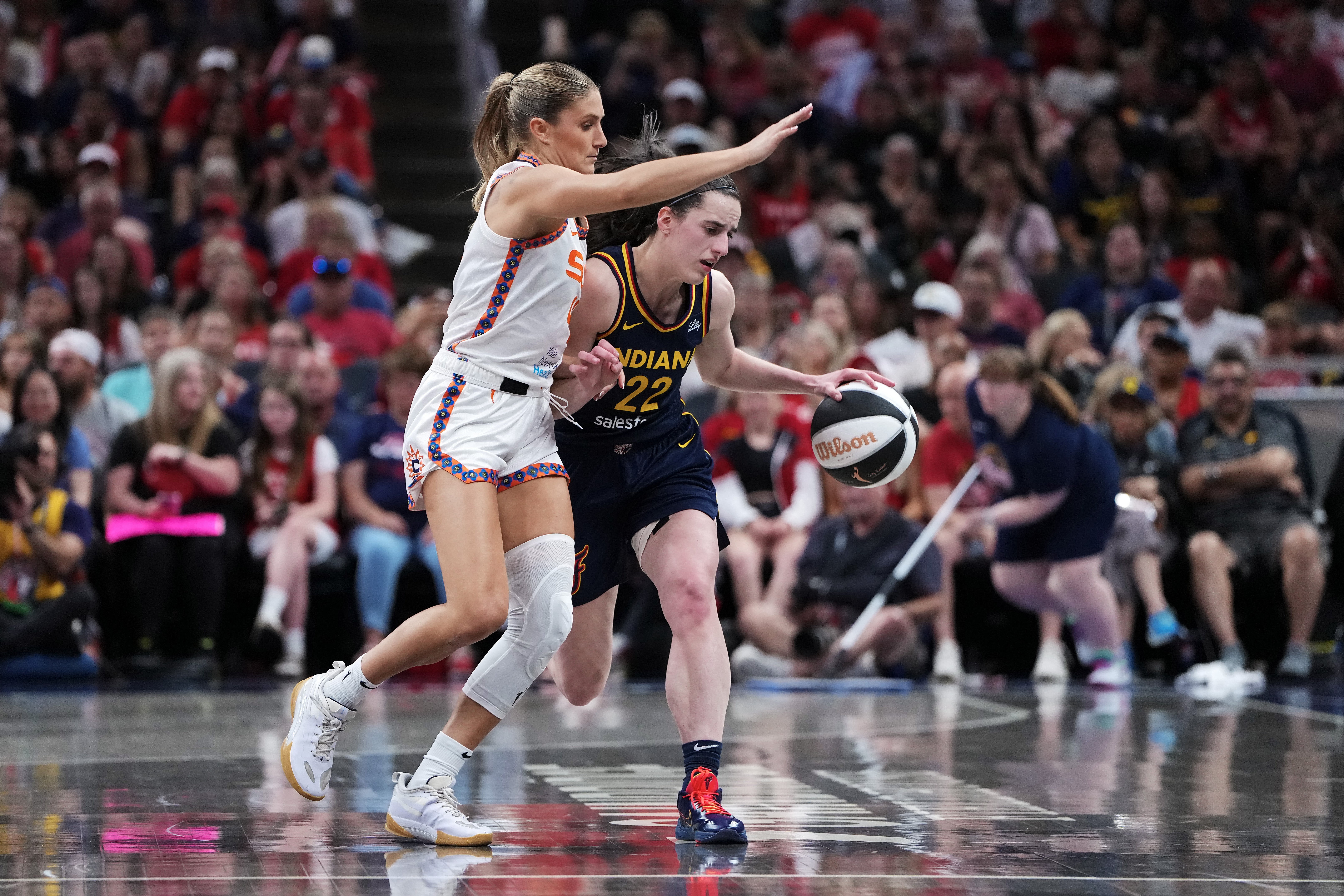 The exchange started when Jacy Sheldon (left) poked Clark in the eye