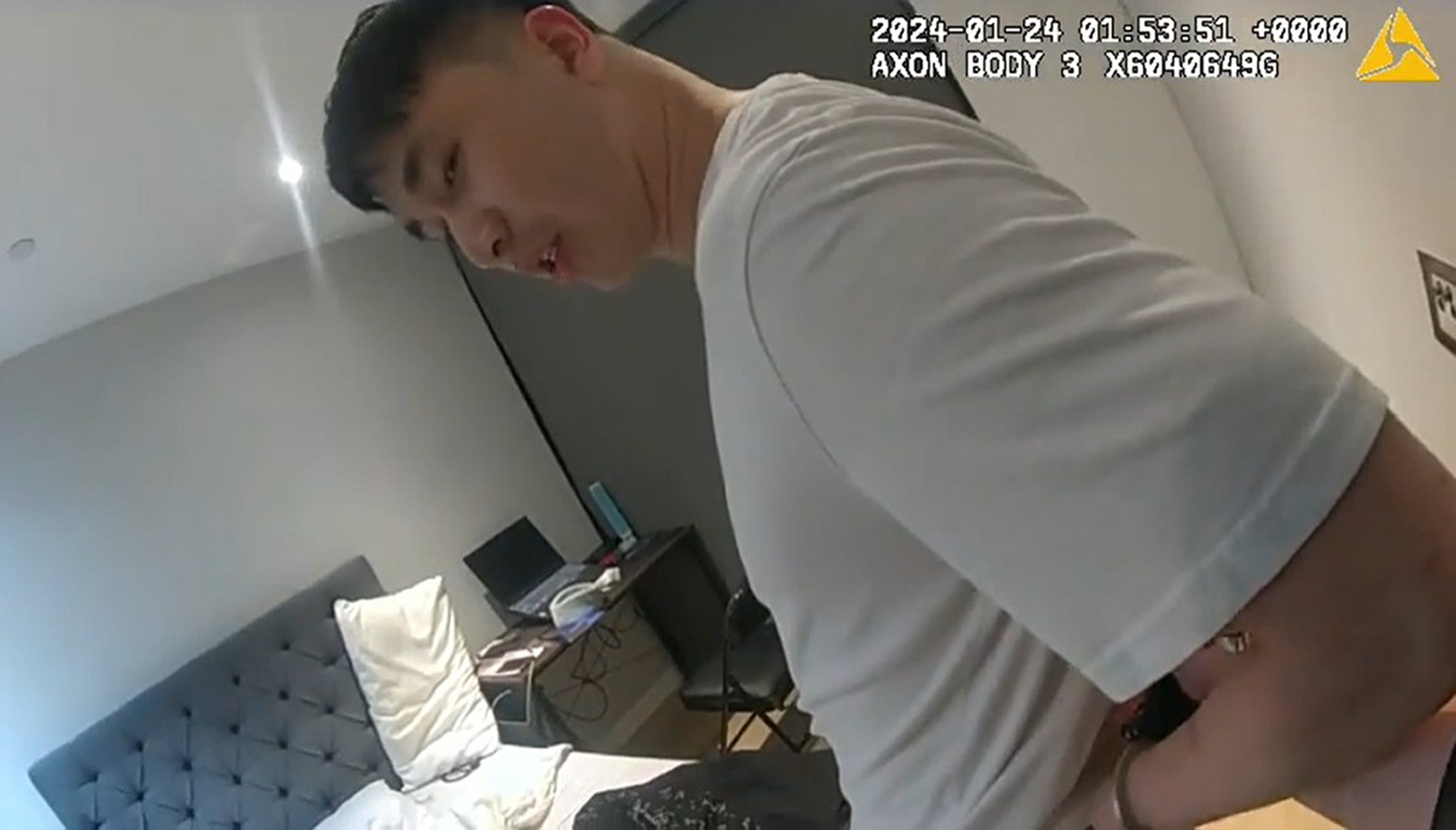 A screengrab from a body-worn camera of the arrest of Zhenhao Zou