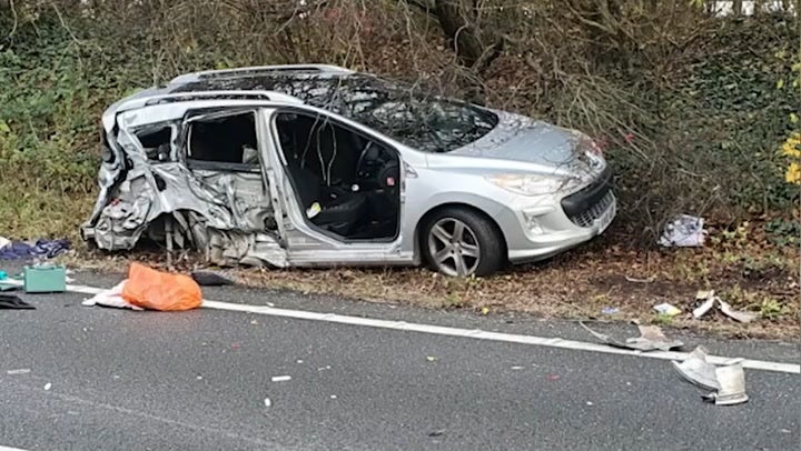 Moment distracted driver on his phone ploughs into broken-down car leaving victim with horrific injuries
