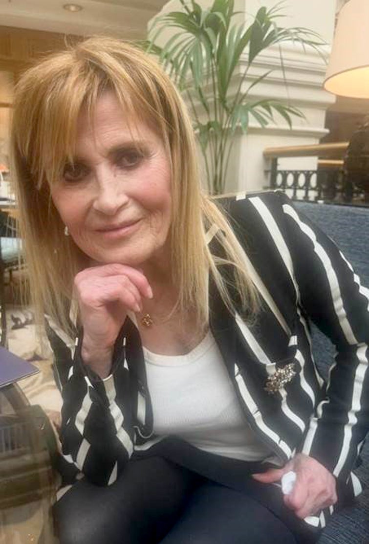 Woman, 66, arrested over death of film director linked to missing diamond-encrusted Rolex