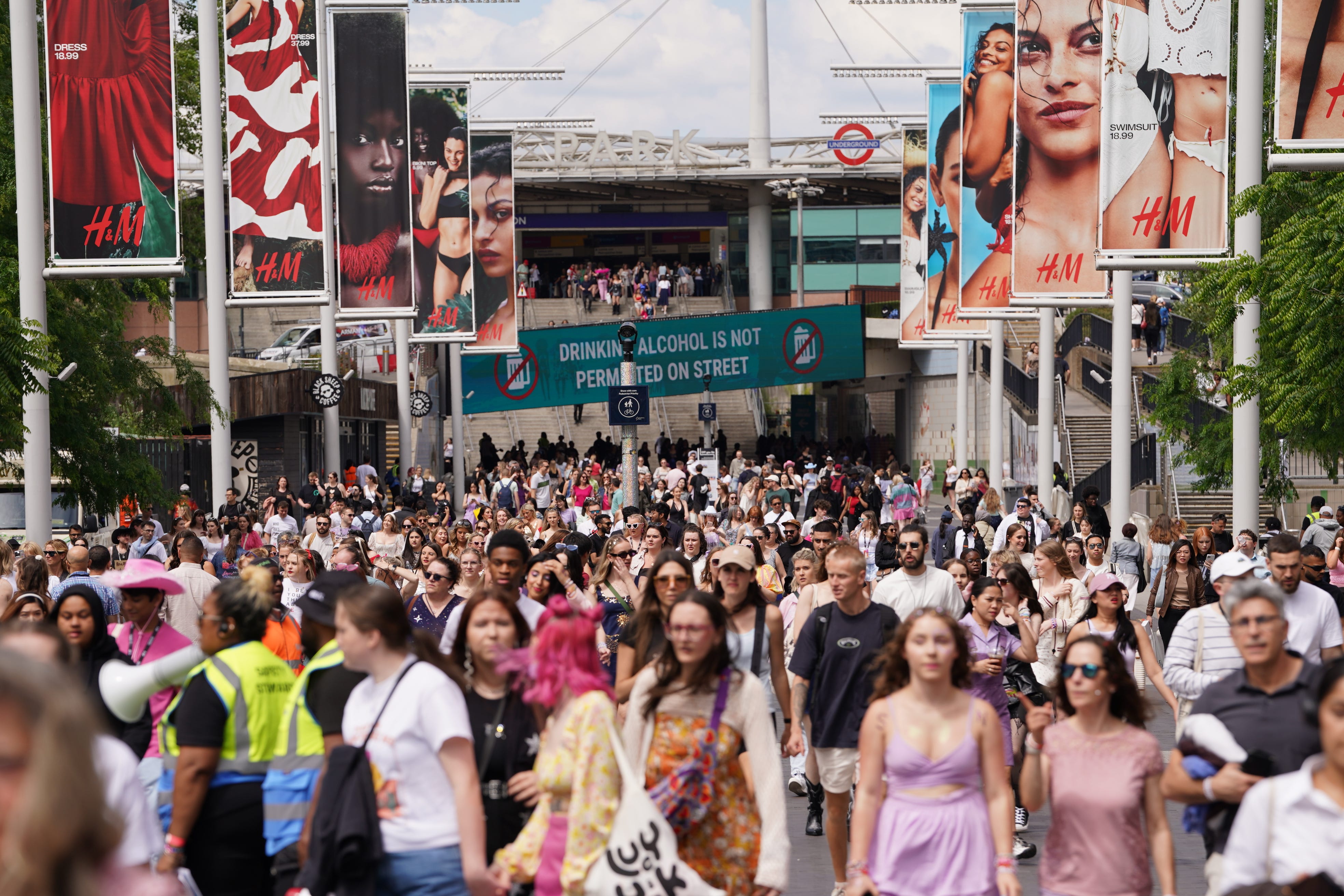 Fans gather outside Wembley Stadium in London, ahead of a Taylor Swift concert in 2024