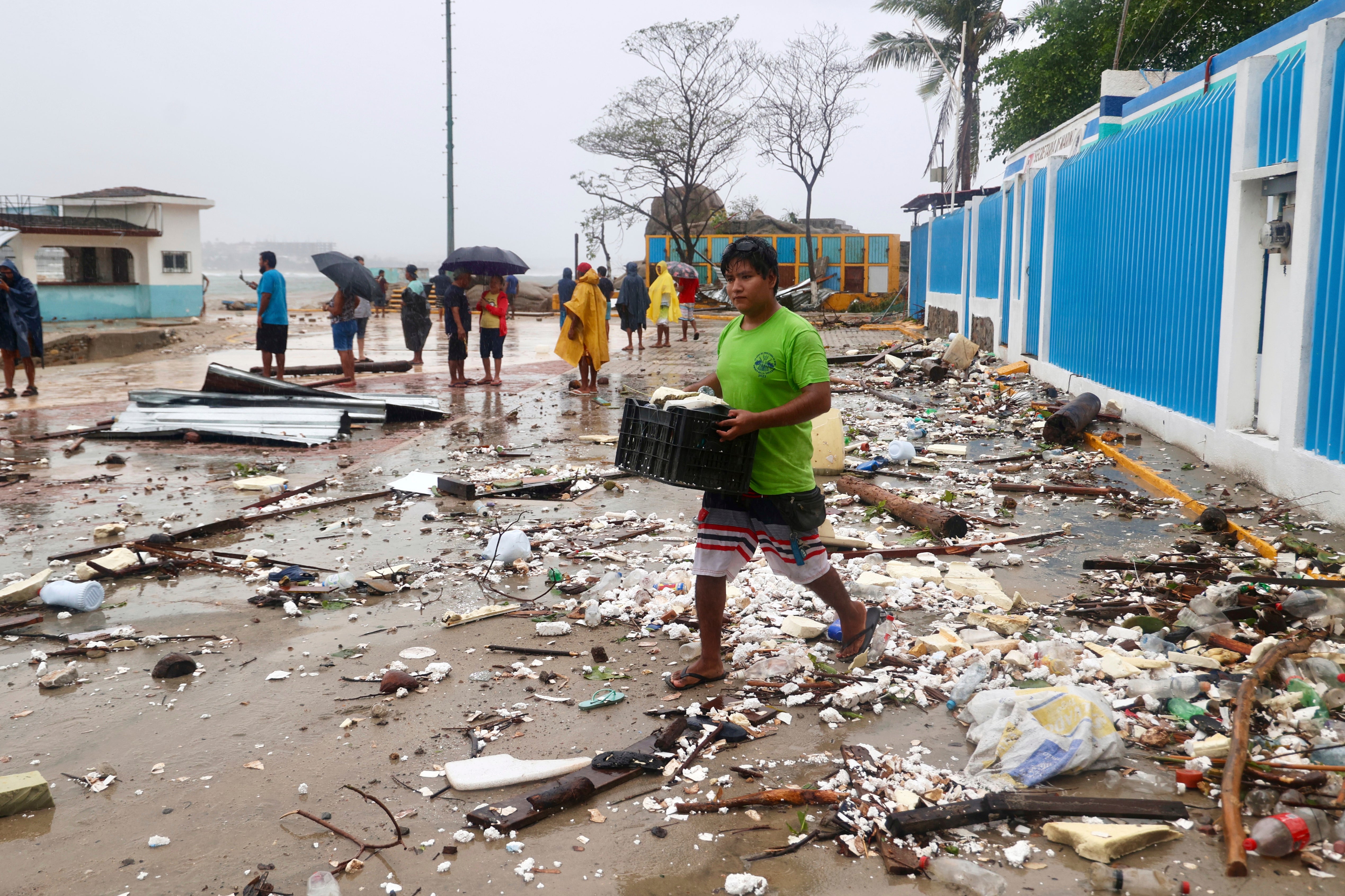 Child drowns in swollen river as Hurricane Erick makes landfall in southern Mexico