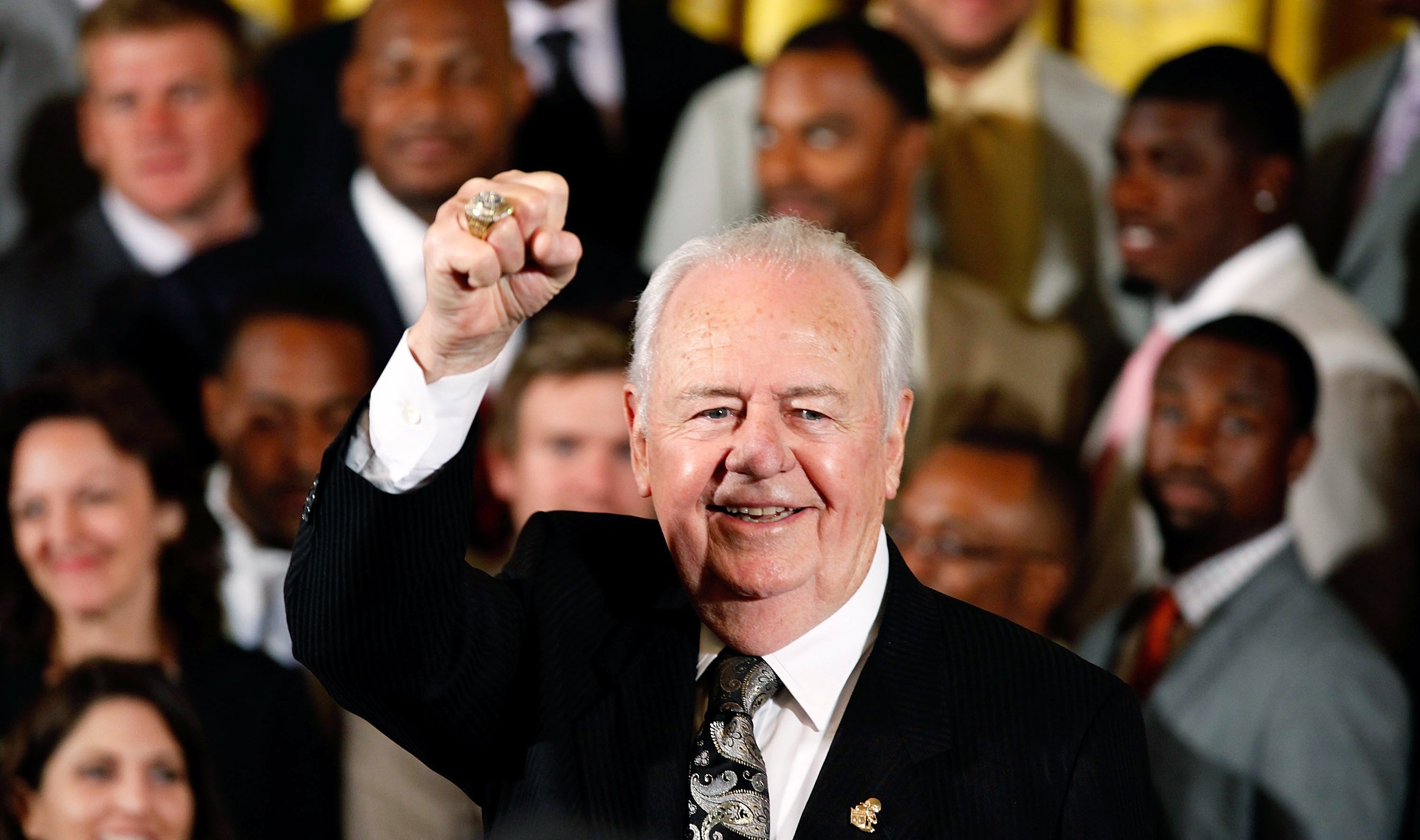 New Orleans Saints owner Tom Benson holds up his championship ring during a reception for the 2010 National Football League Super Bowl champions at the White House August 9, 2010 in Washington, DC