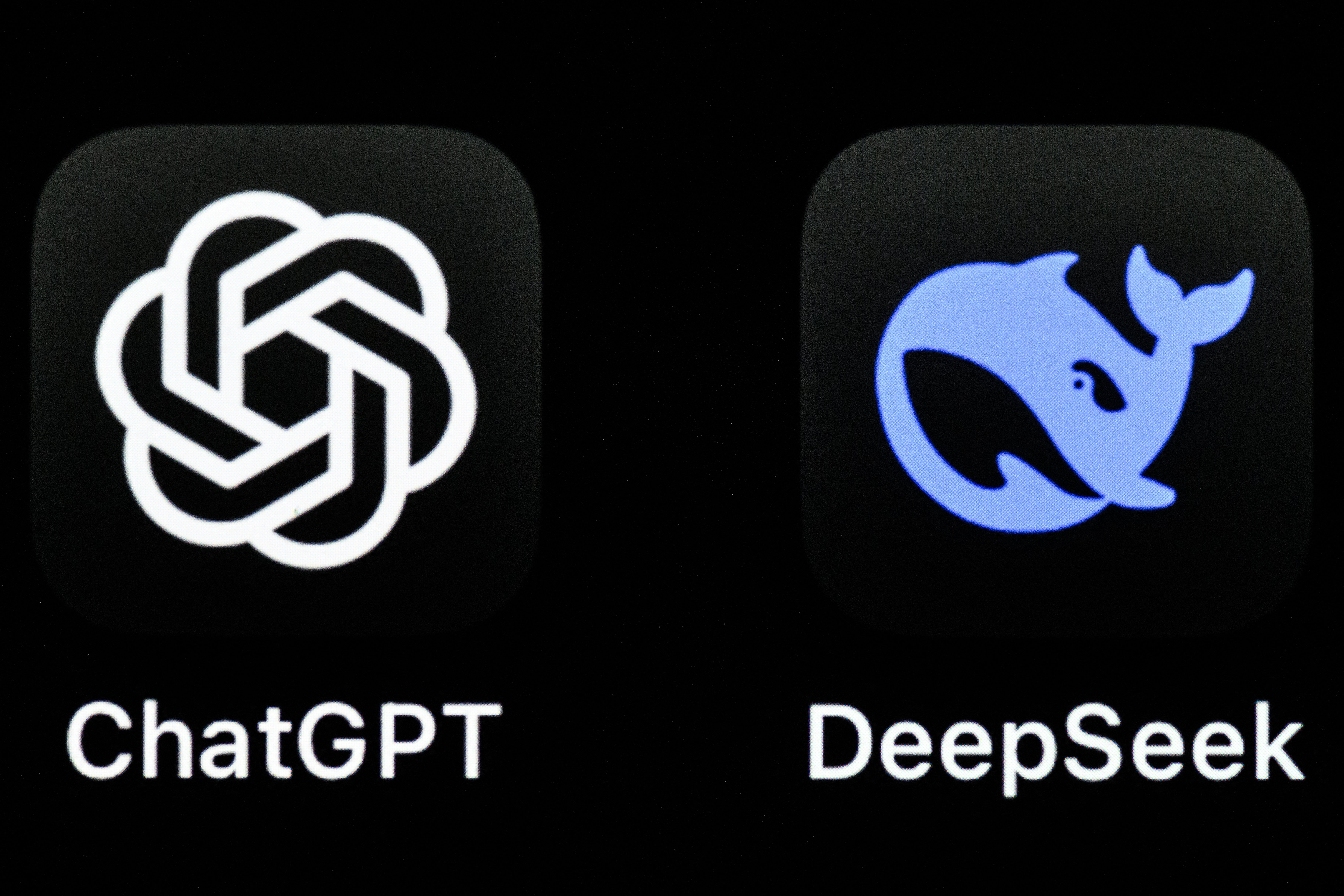 Tablet screen displaying logos of ChatGPT and DeepSeek chatbots