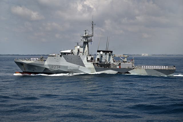 <p>Personnel onboard the British Navy's HMS Spey </p>