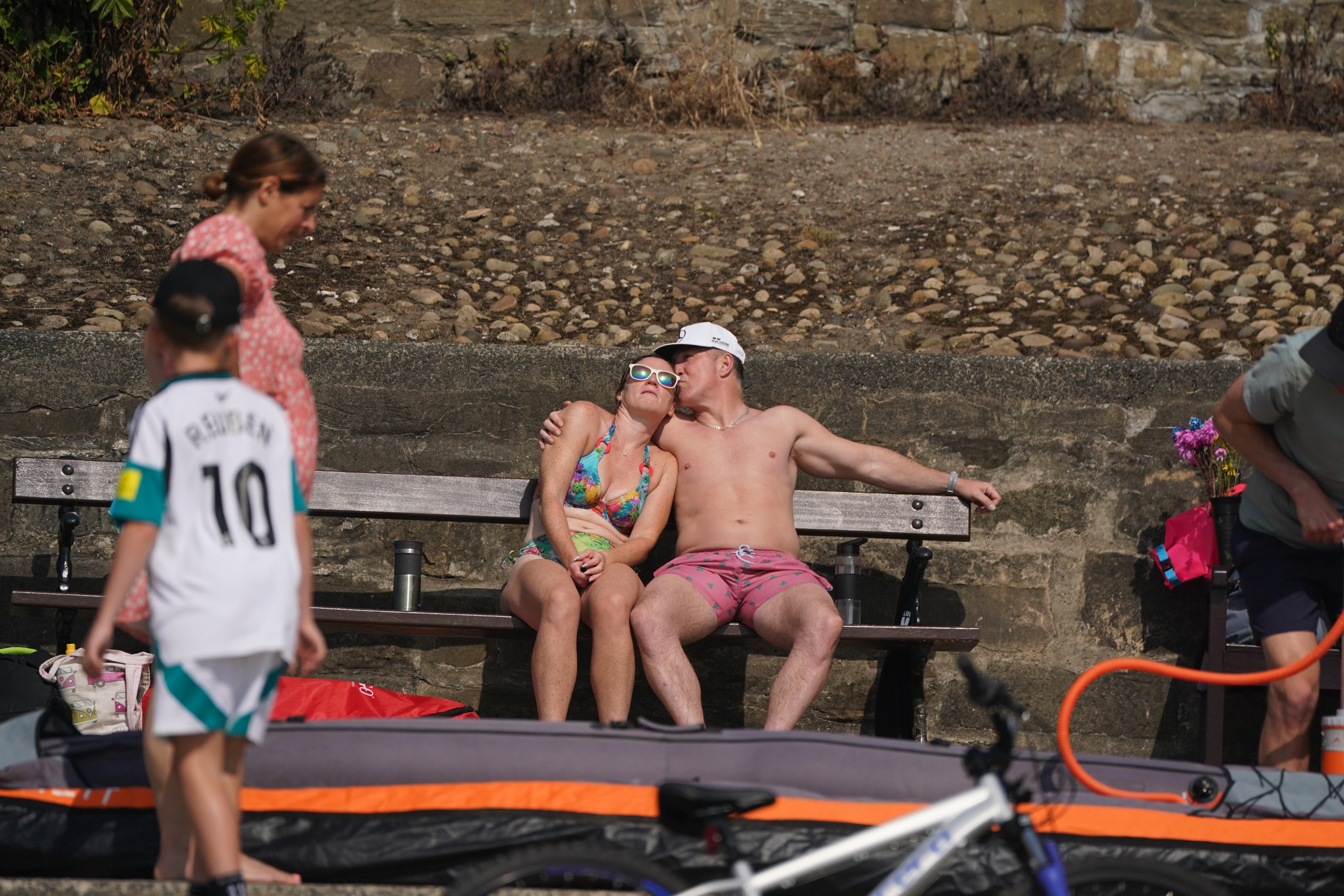 People enjoy the hot weather at Cullercoats Beach in North Shields