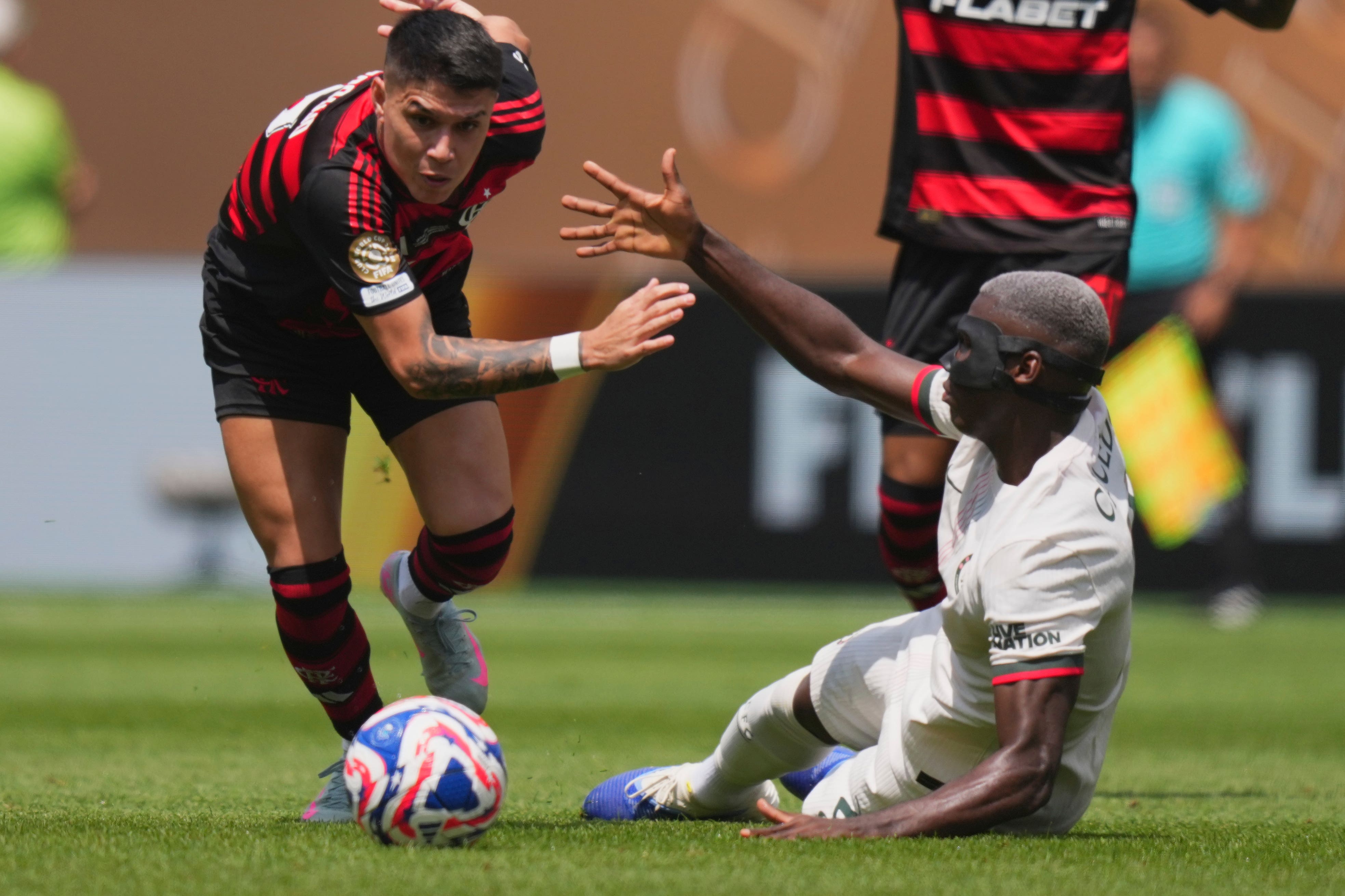 Moises Caicedo (left) says Chelsea will learn lessons from defeat to Flamengo (AP Photo/Chris Szagola)
